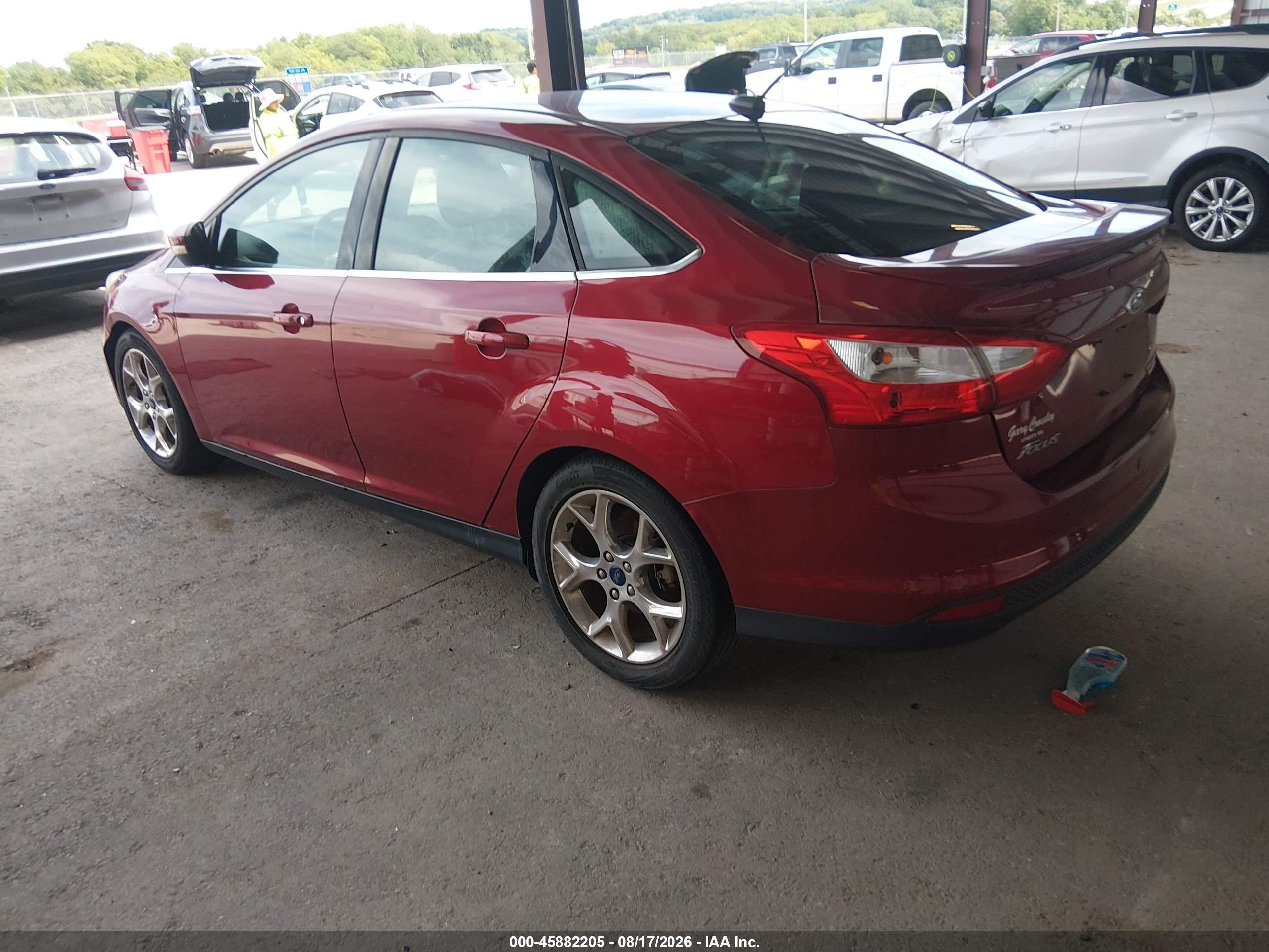 2014 Ford Focus Titanium Red vin: 1FADP3J25EL430889