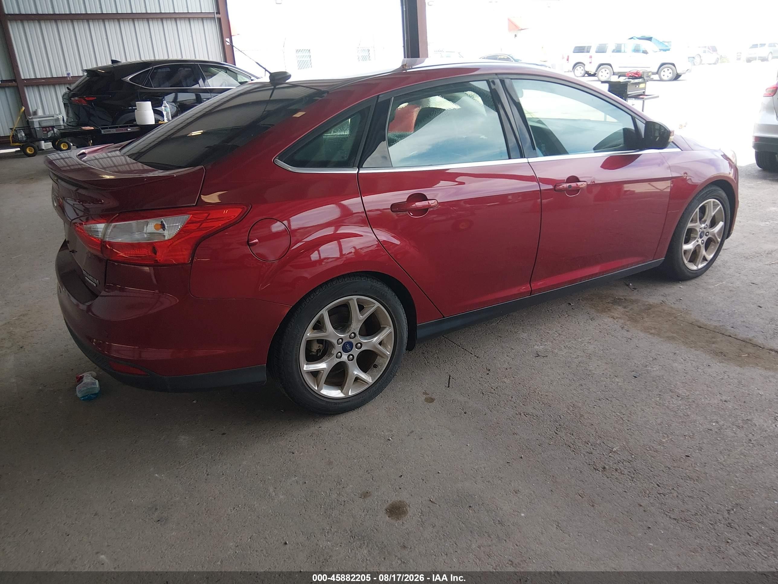 2014 Ford Focus Titanium Red vin: 1FADP3J25EL430889