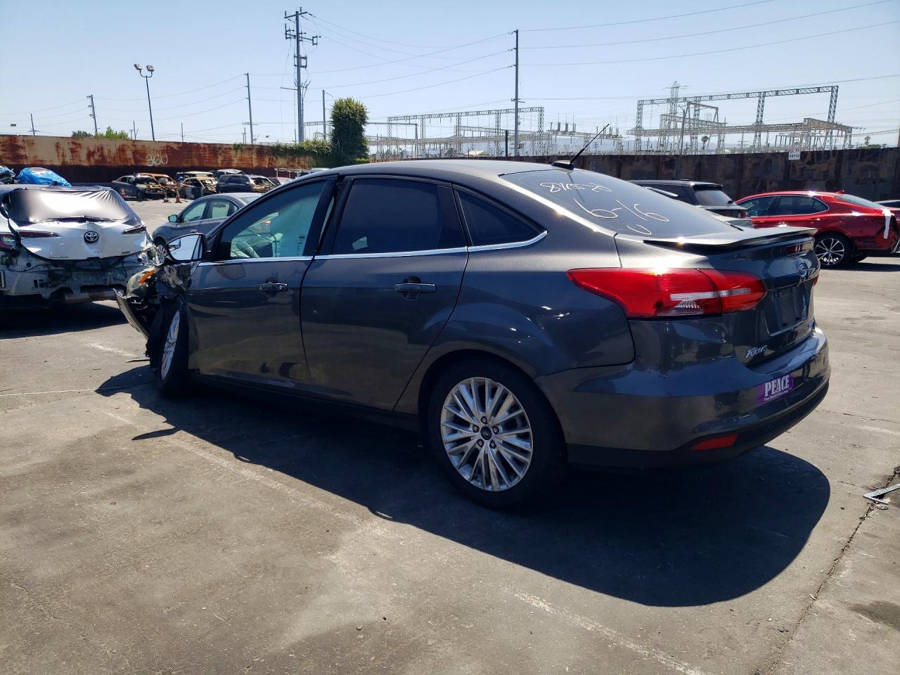 2015 Ford Focus Titanium Серый vin: 1FADP3J25FL231858