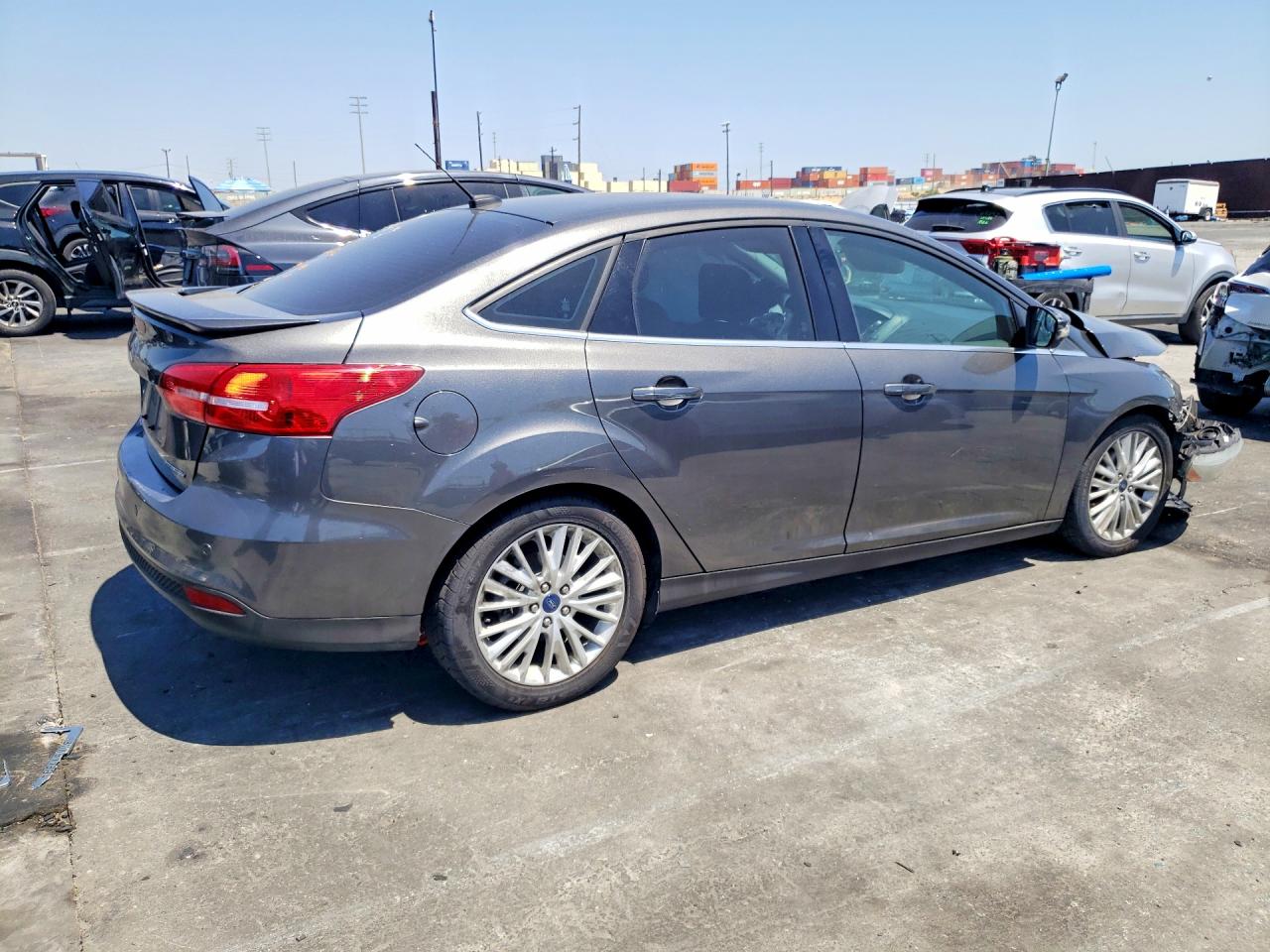 2015 Ford Focus Titanium Серый vin: 1FADP3J25FL231858