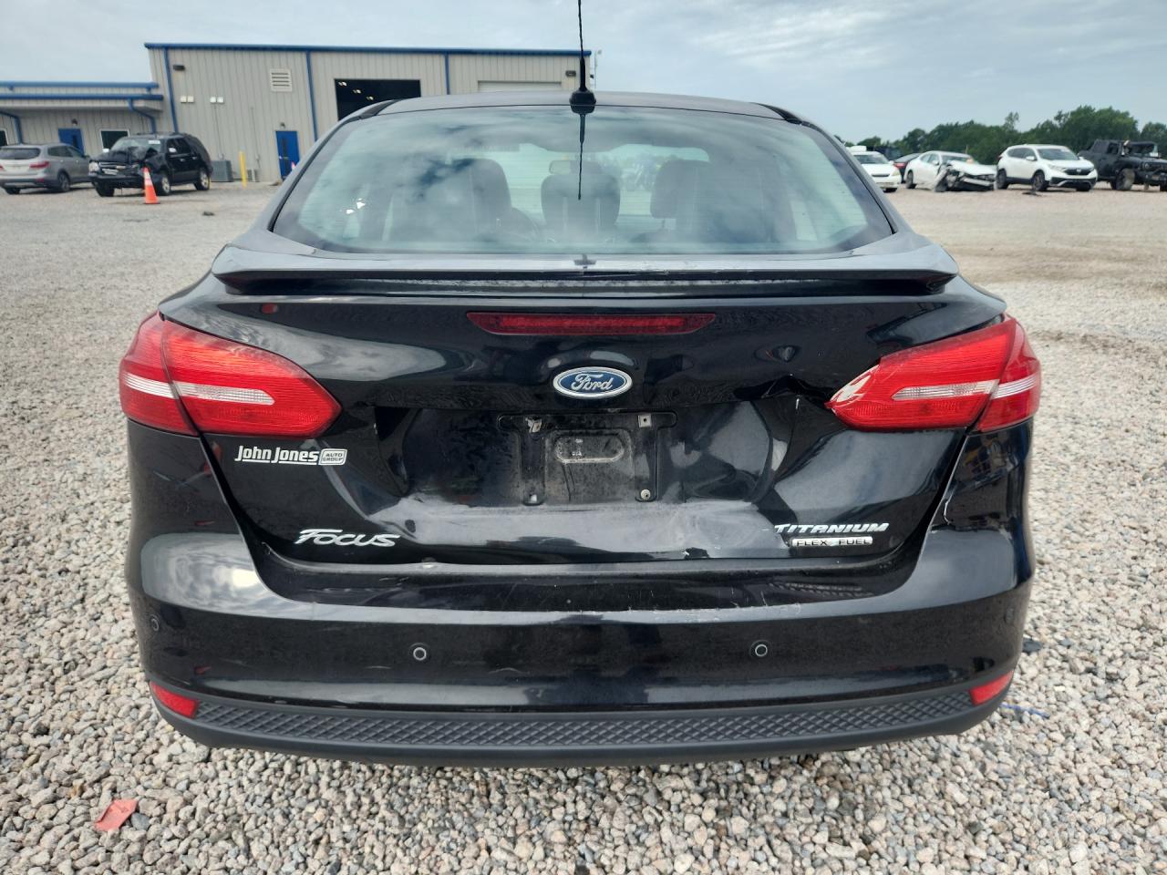 2015 Ford Focus Titanium Black vin: 1FADP3J25FL238230
