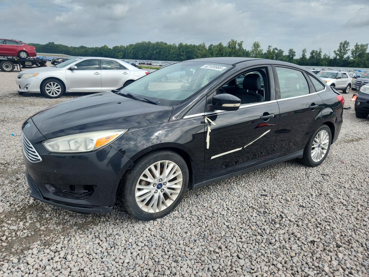 2015 Ford Focus Titanium Black vin: 1FADP3J25FL238230