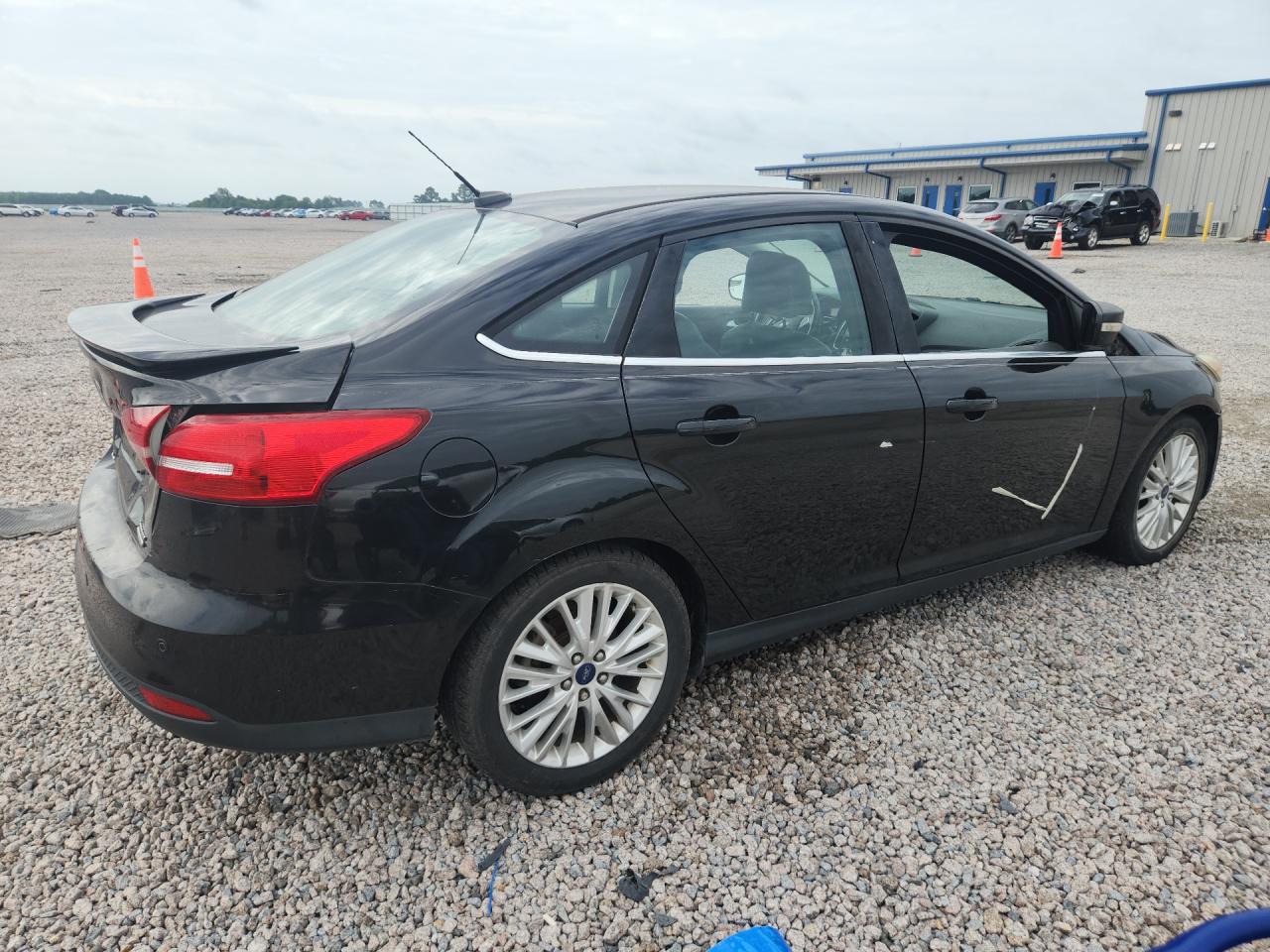 2015 Ford Focus Titanium Black vin: 1FADP3J25FL238230
