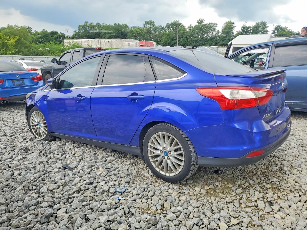 2013 Ford Focus Titanium Blue vin: 1FADP3J26DL188418