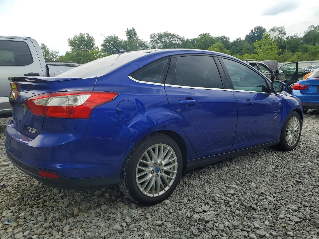 2013 Ford Focus Titanium Blue vin: 1FADP3J26DL188418