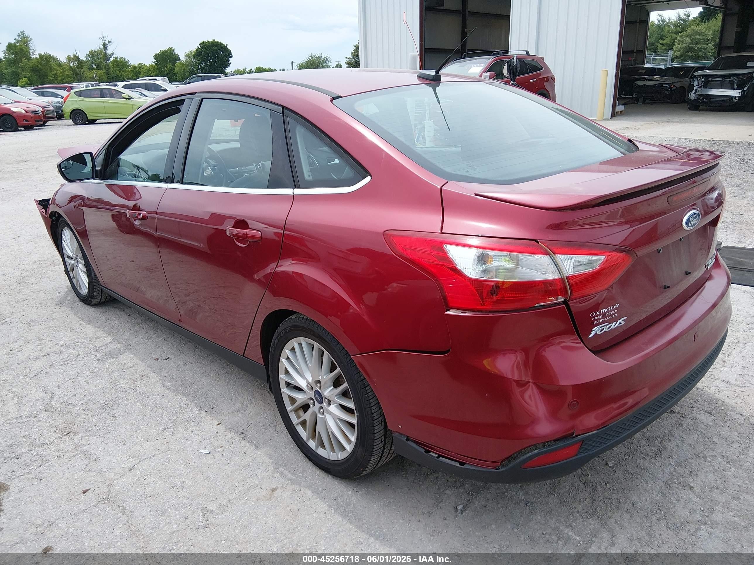 2014 Ford Focus Titanium Red vin: 1FADP3J26EL105412