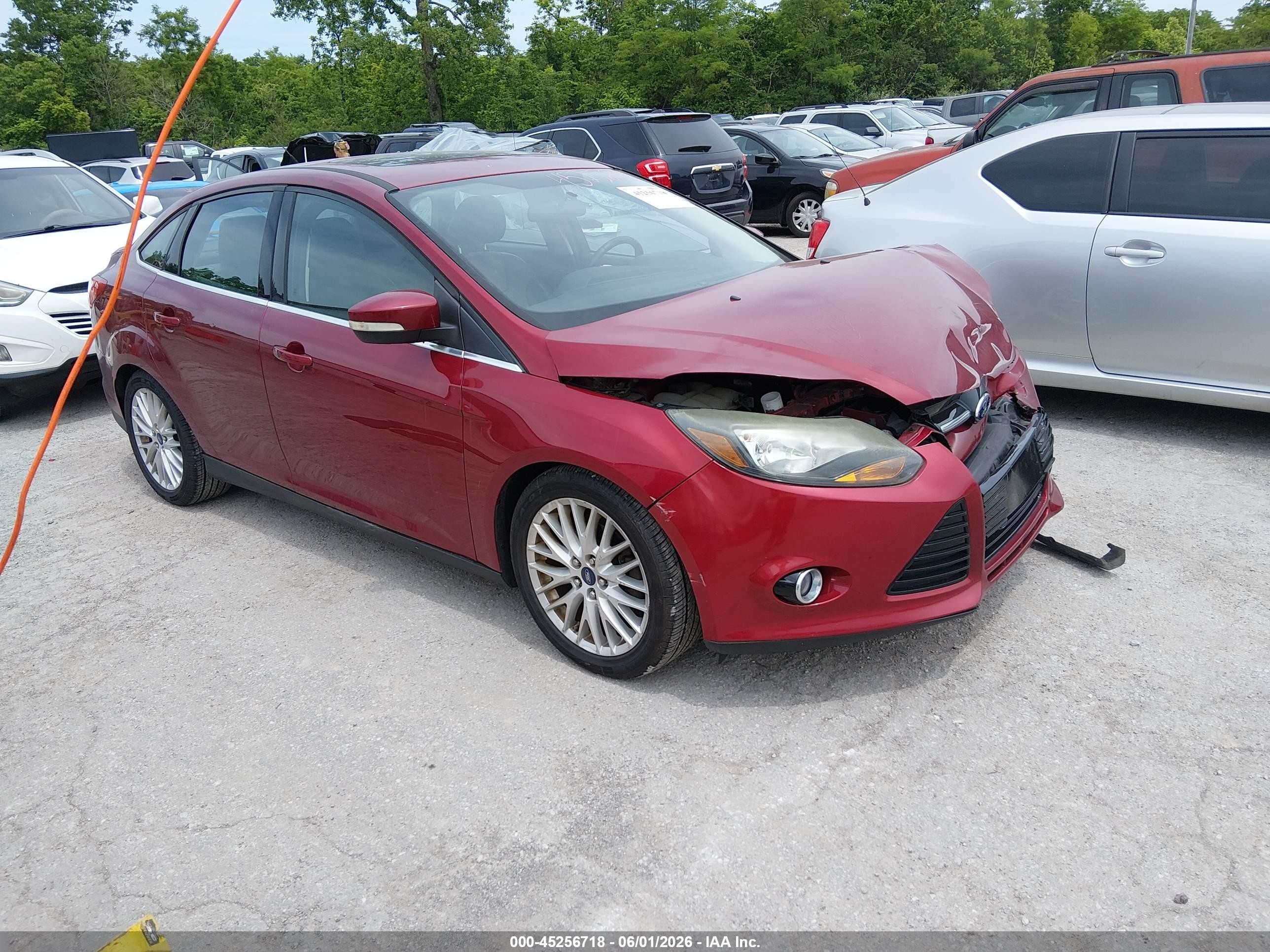 2014 Ford Focus Titanium Red vin: 1FADP3J26EL105412