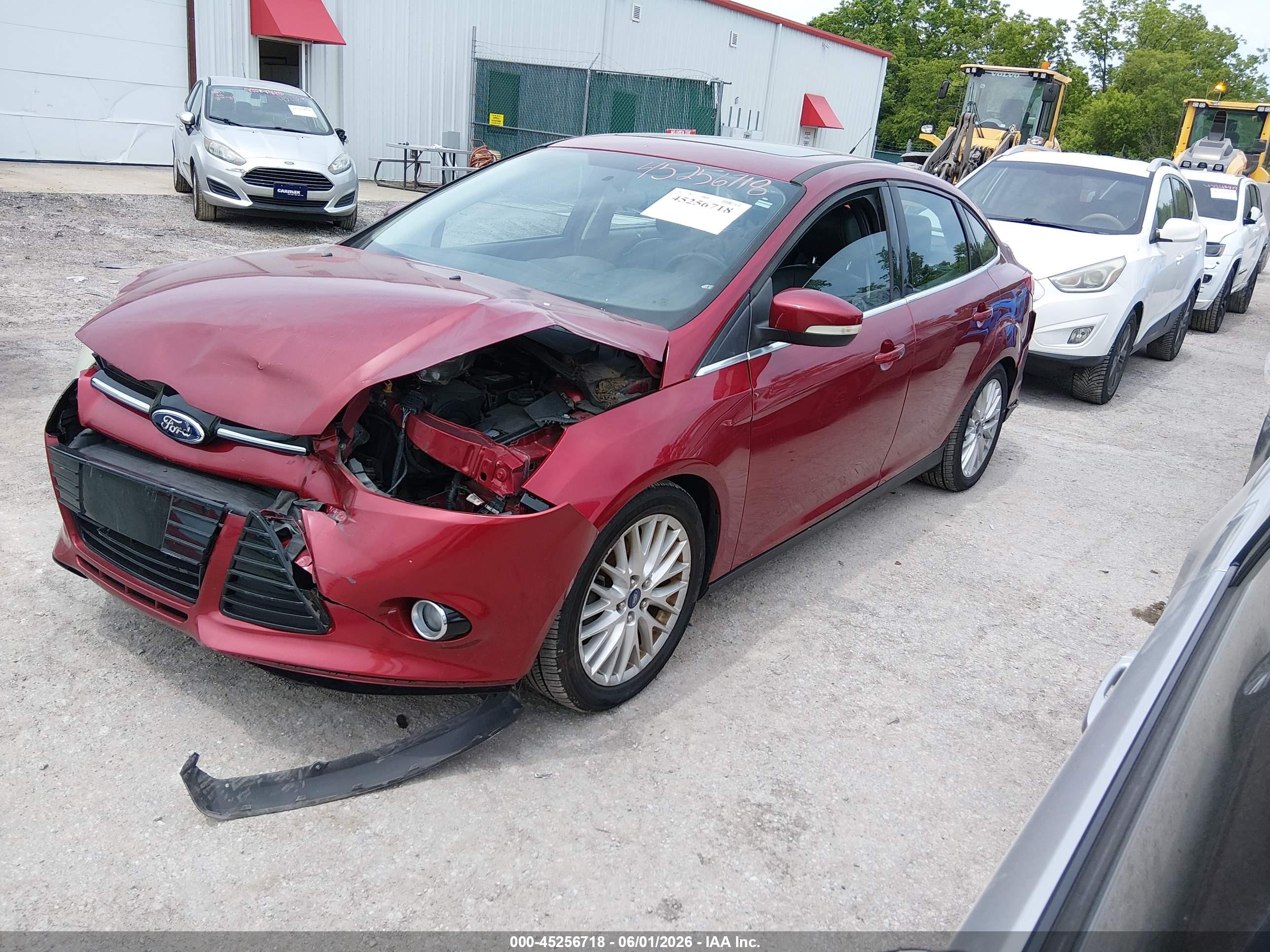 2014 Ford Focus Titanium Red vin: 1FADP3J26EL105412