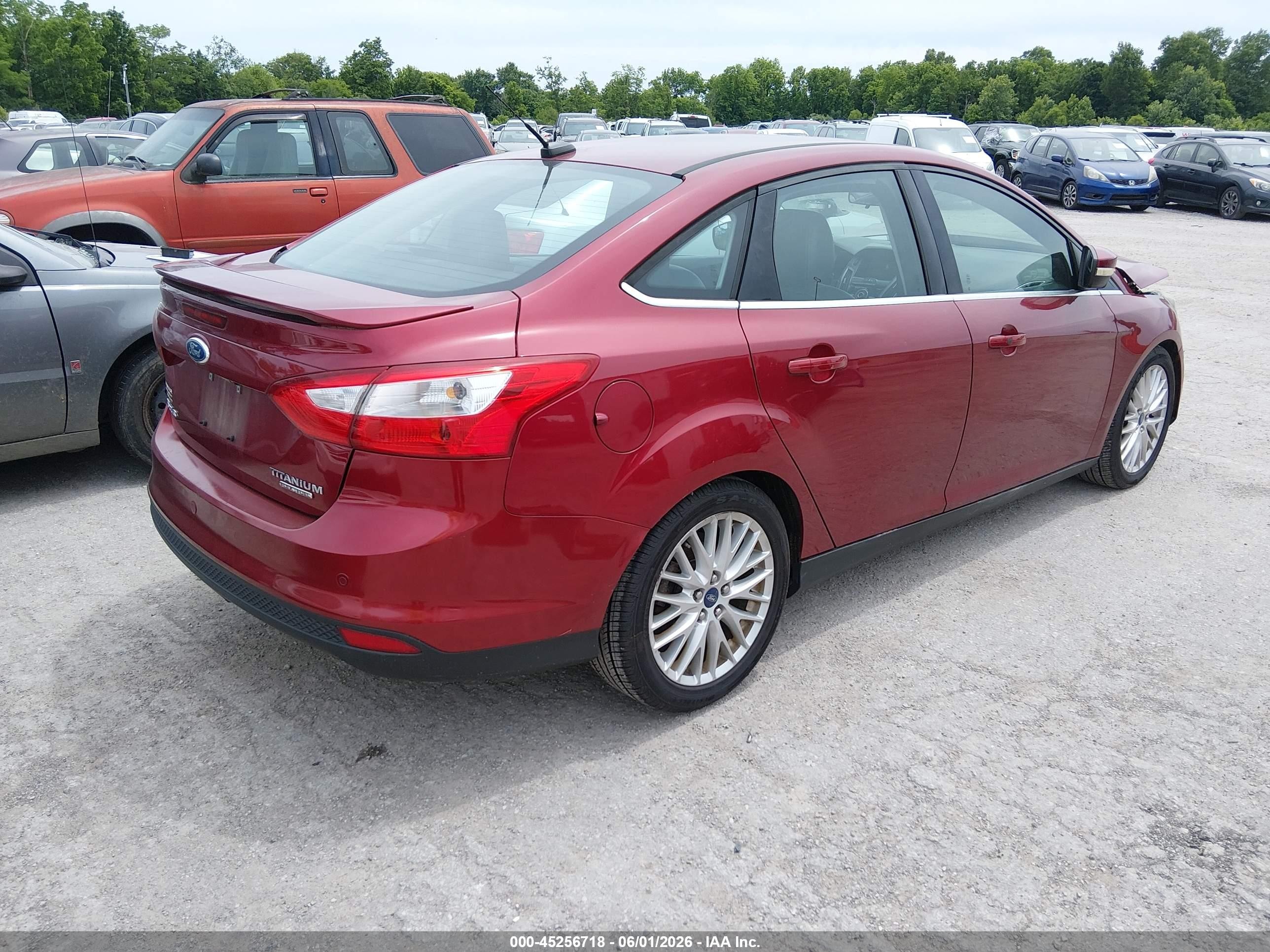2014 Ford Focus Titanium Red vin: 1FADP3J26EL105412