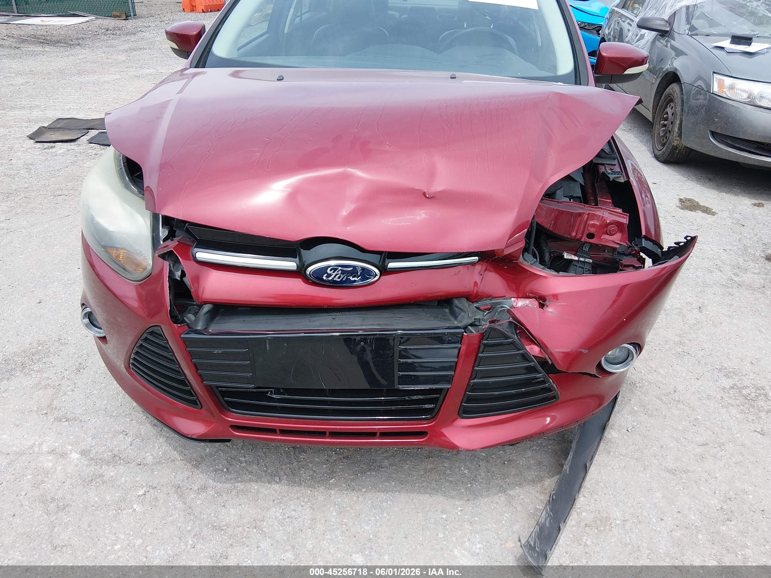 2014 Ford Focus Titanium Red vin: 1FADP3J26EL105412