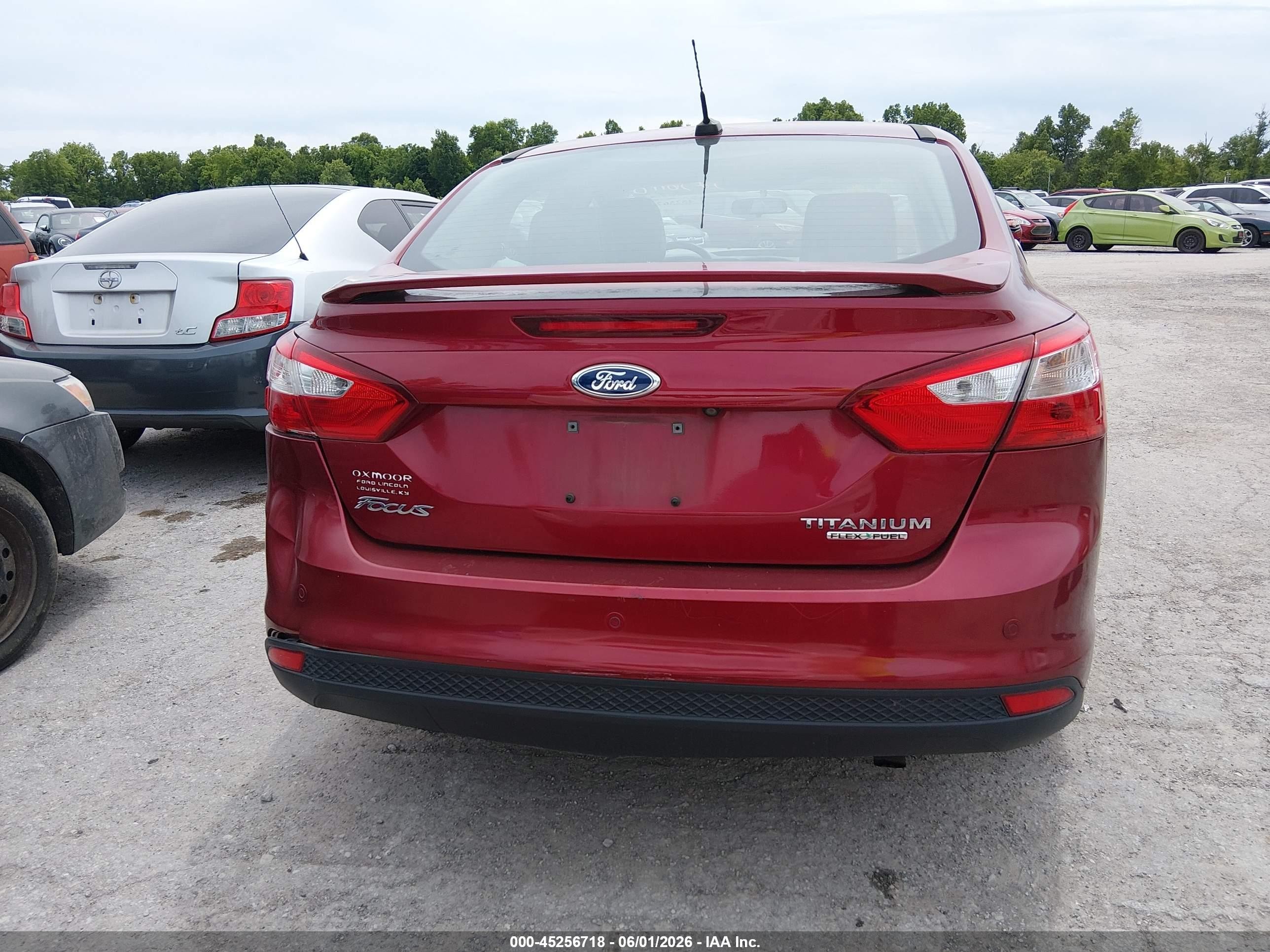 2014 Ford Focus Titanium Red vin: 1FADP3J26EL105412