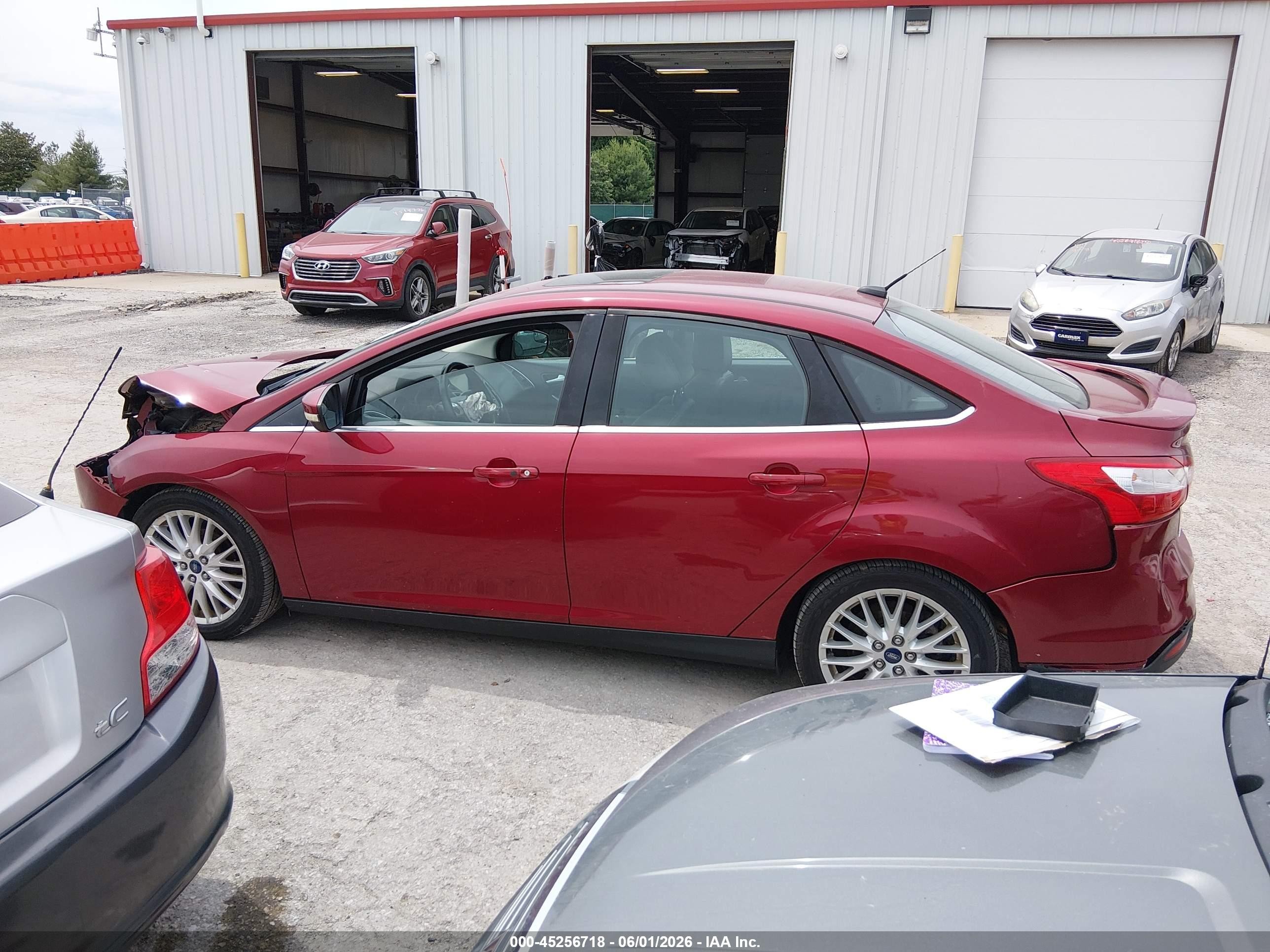 2014 Ford Focus Titanium Red vin: 1FADP3J26EL105412