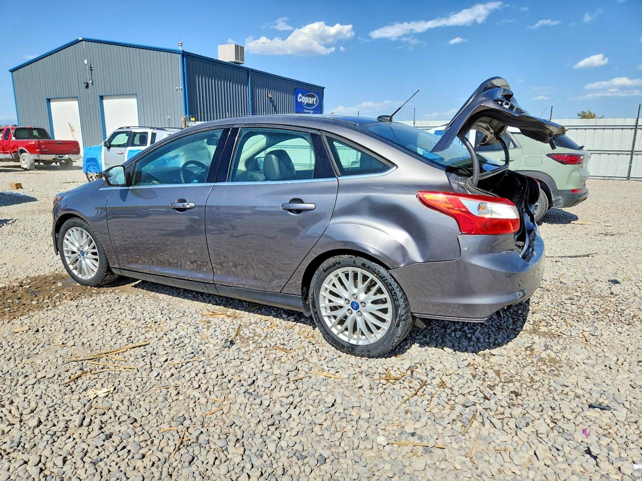 2014 Ford Focus Titanium Gray vin: 1FADP3J26EL225016