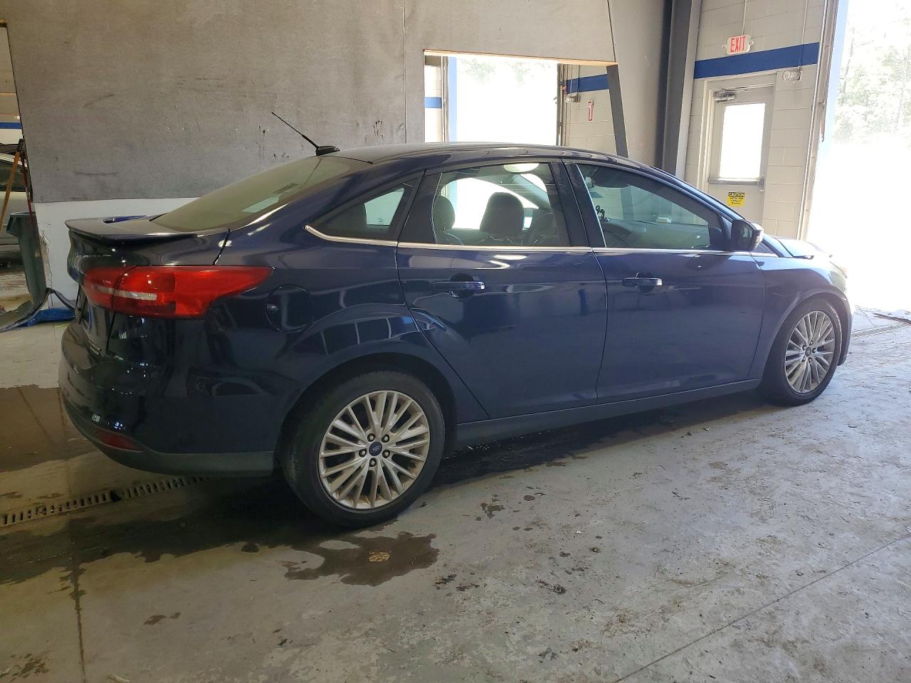 2016 Ford Focus Titanium Blue vin: 1FADP3J26GL335759