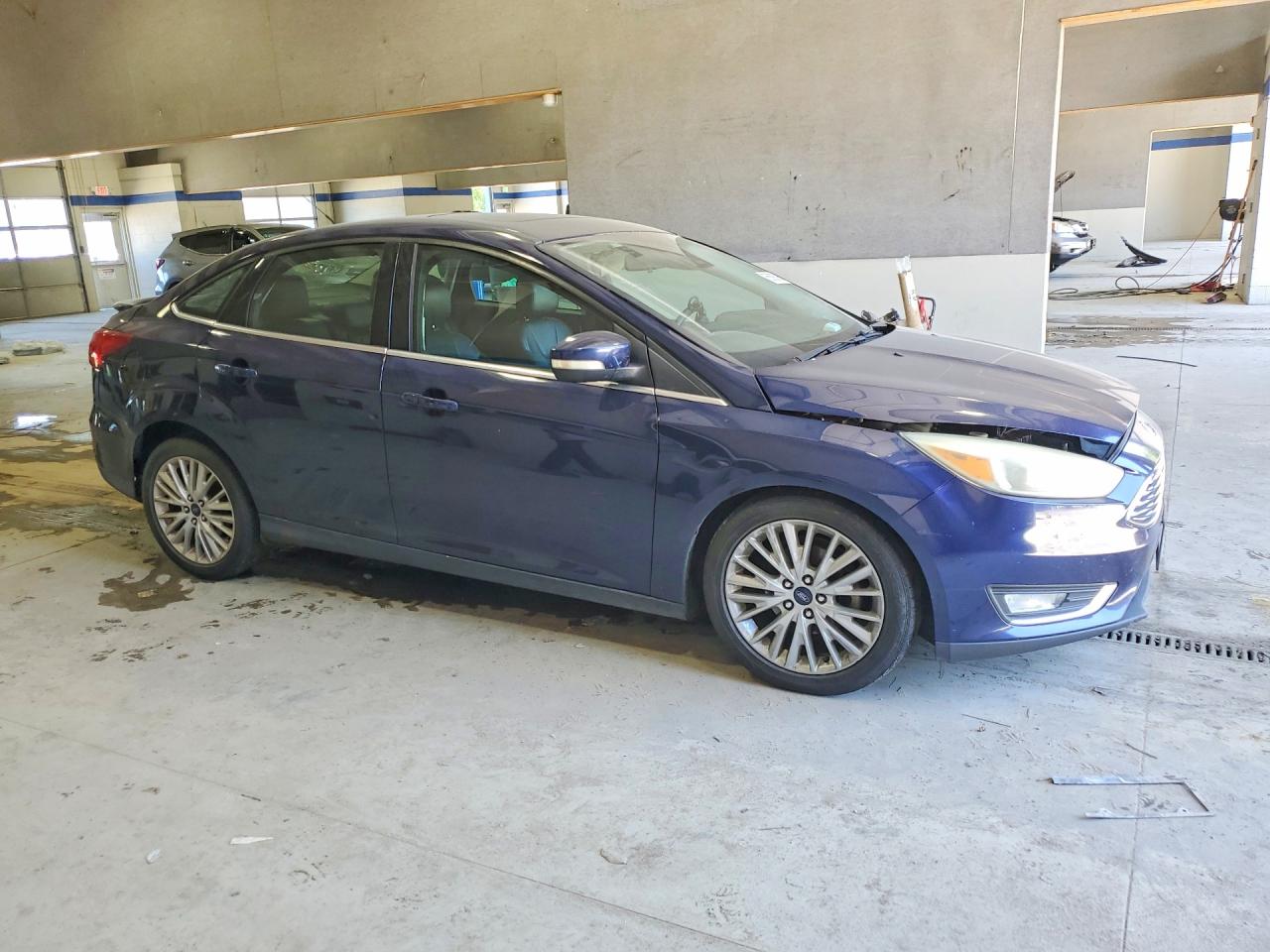 2016 Ford Focus Titanium Blue vin: 1FADP3J26GL335759