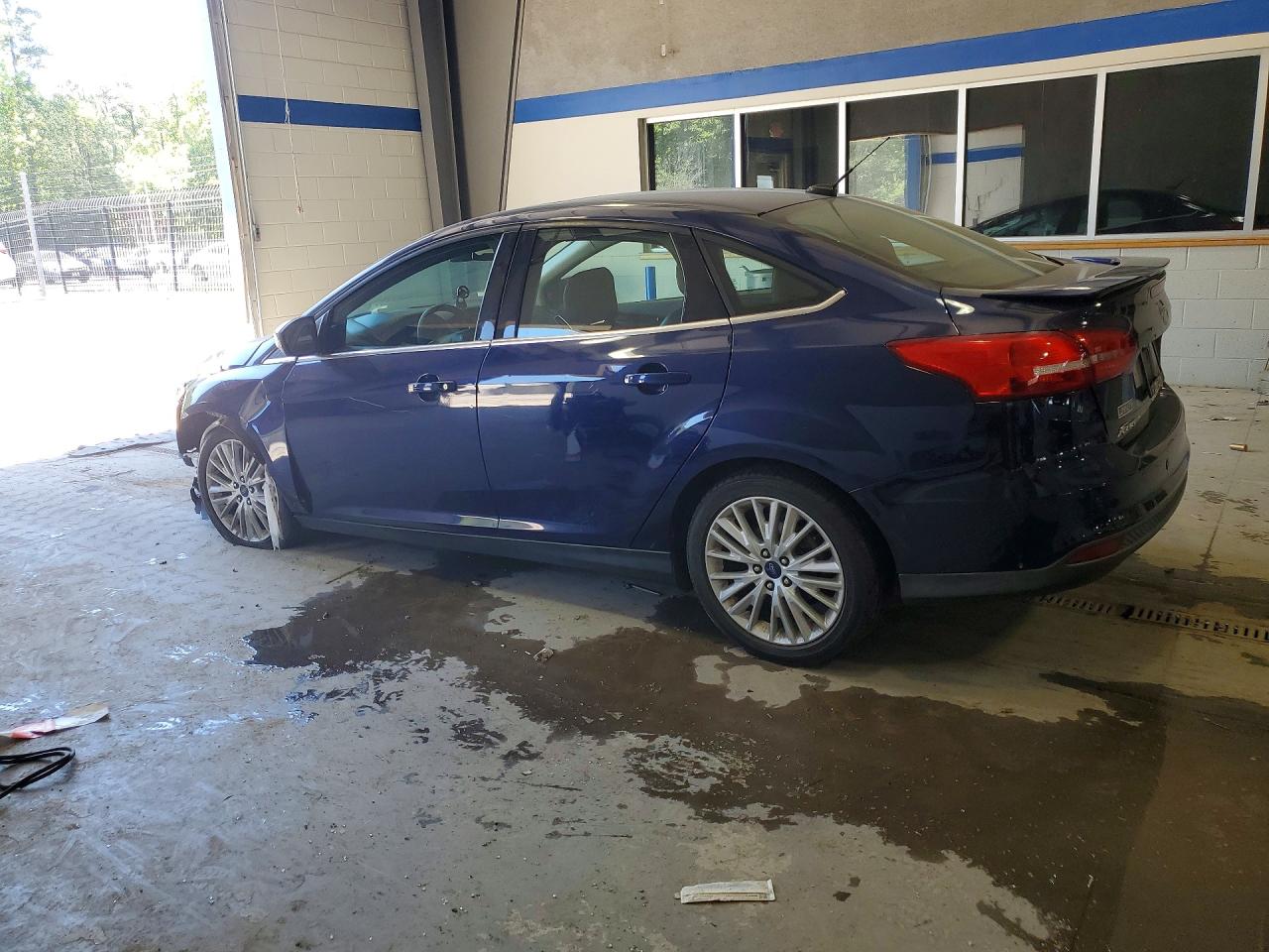 2016 Ford Focus Titanium Blue vin: 1FADP3J26GL335759