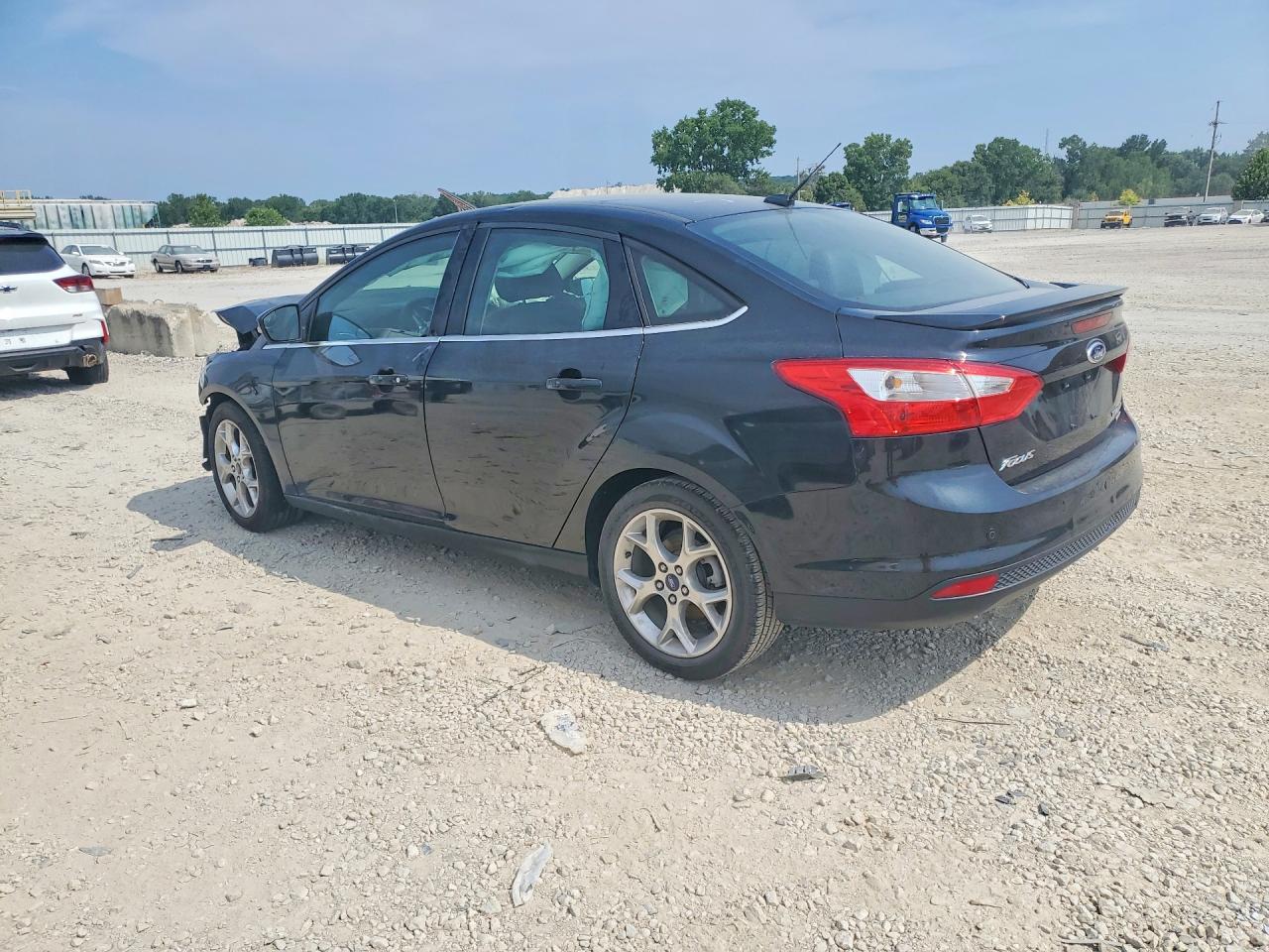 2013 Ford Focus Titanium Black vin: 1FADP3J27DL262607