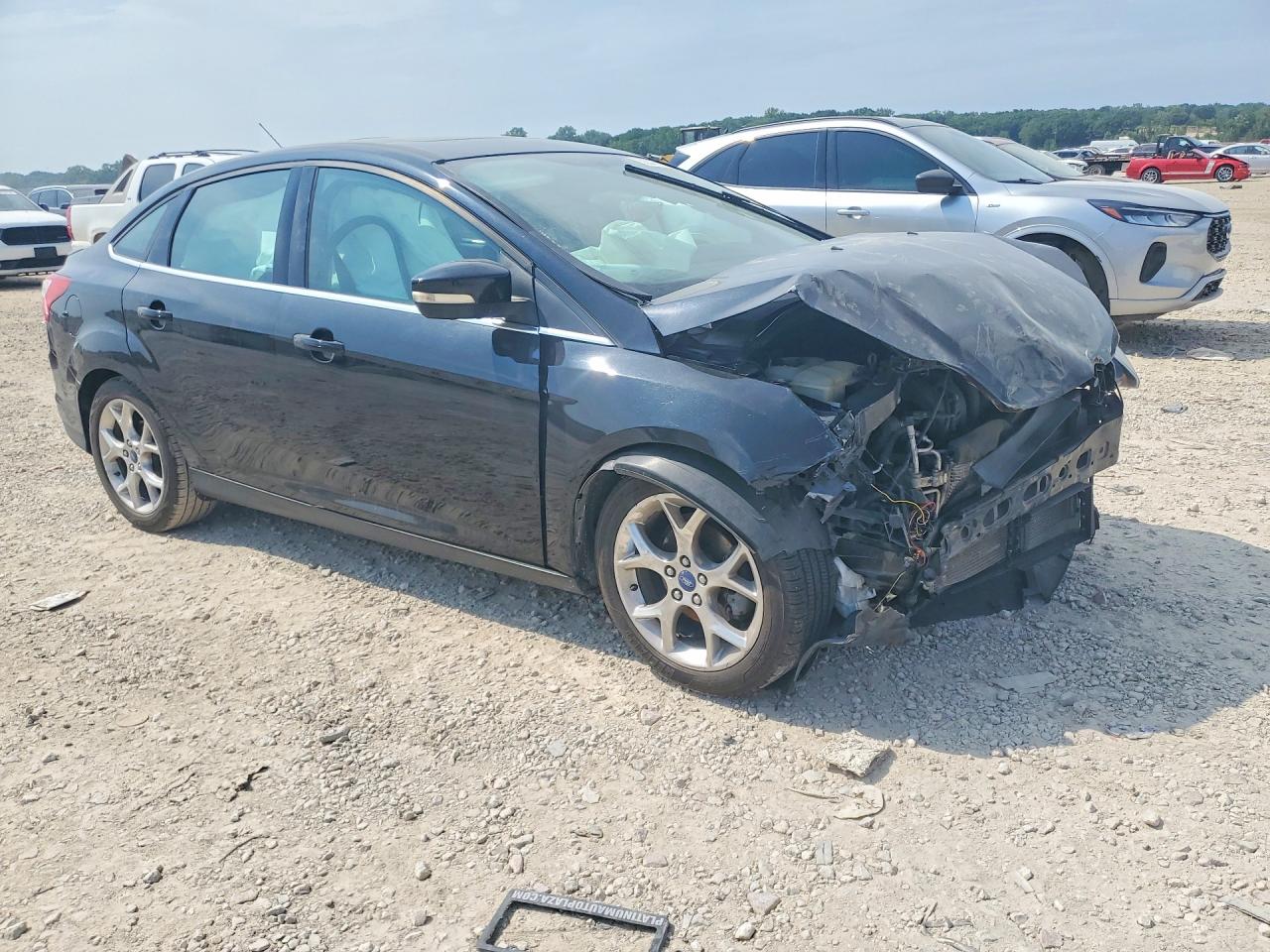 2013 Ford Focus Titanium Black vin: 1FADP3J27DL262607