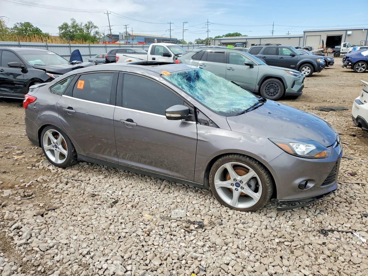 2014 Ford Focus Titanium Black vin: 1FADP3J27EL106911