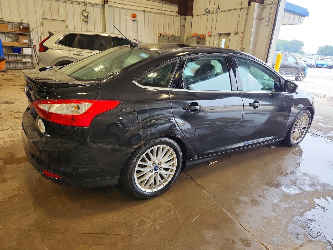 2014 Ford Focus Titanium Black vin: 1FADP3J27EL230046
