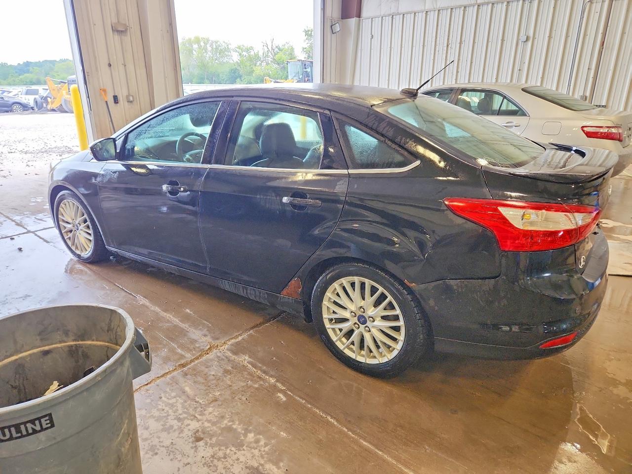 2014 Ford Focus Titanium Black vin: 1FADP3J27EL230046
