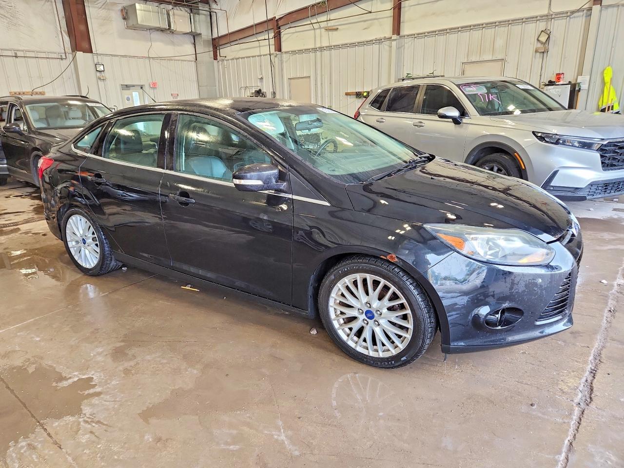 2014 Ford Focus Titanium Black vin: 1FADP3J27EL230046
