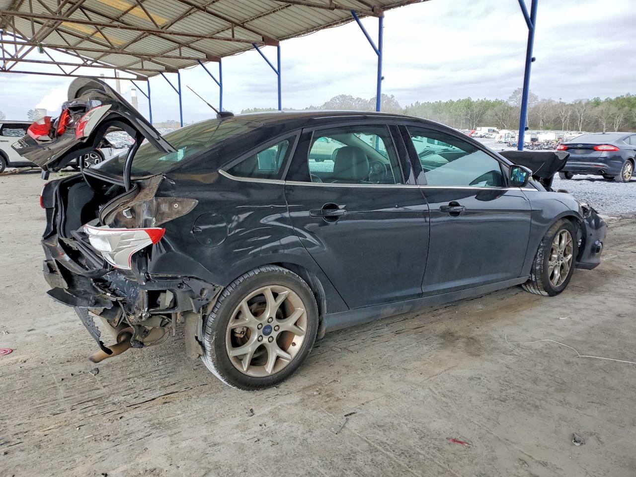 2014 Ford Focus Titanium Black vin: 1FADP3J27EL292241