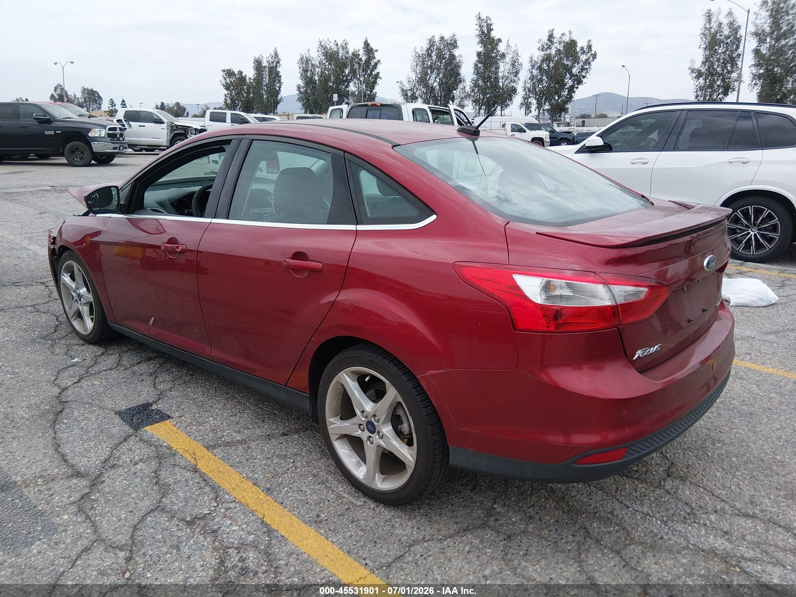 2014 Ford Focus Titanium Red vin: 1FADP3J27EL300435
