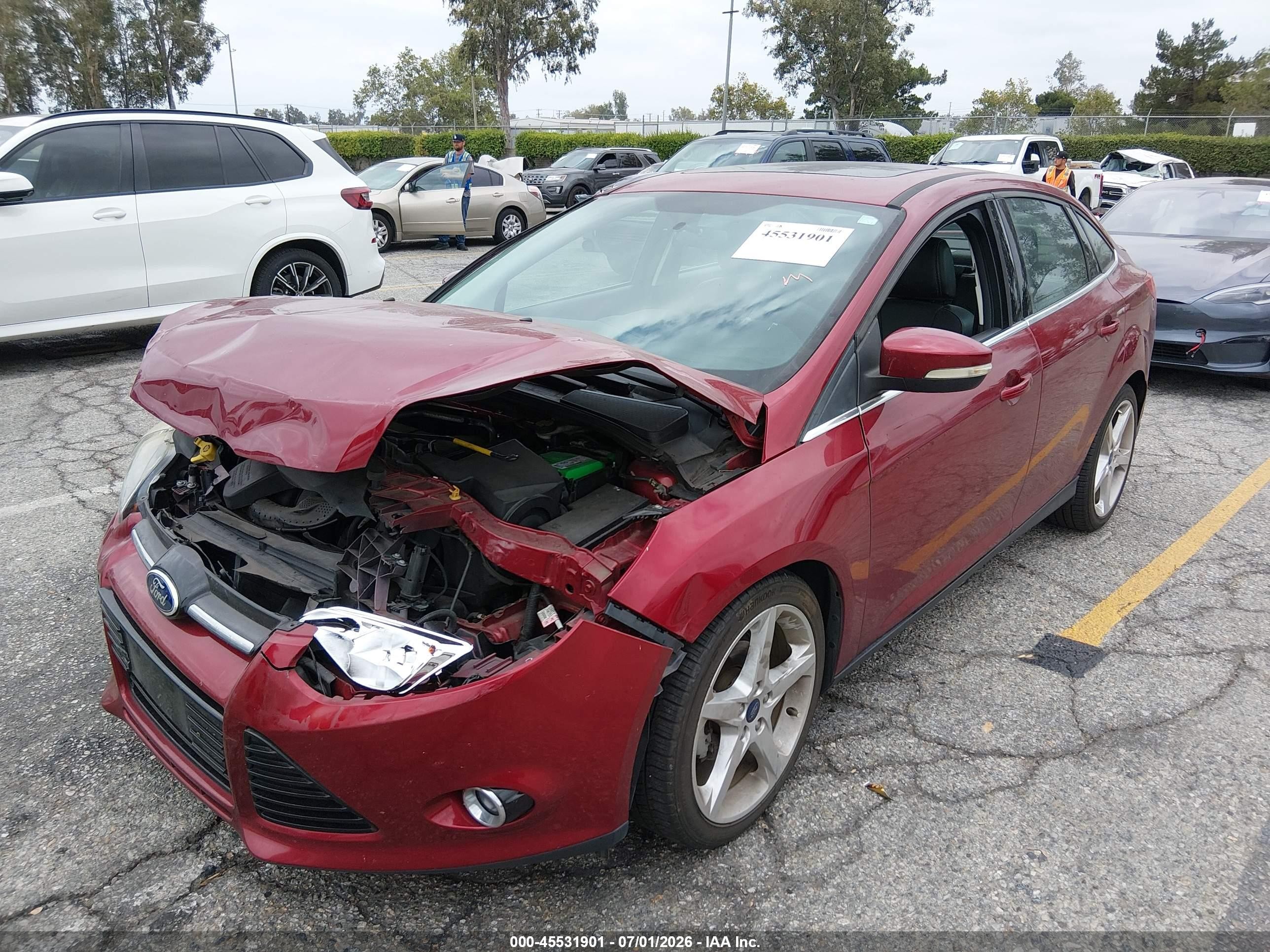 2014 Ford Focus Titanium Red vin: 1FADP3J27EL300435