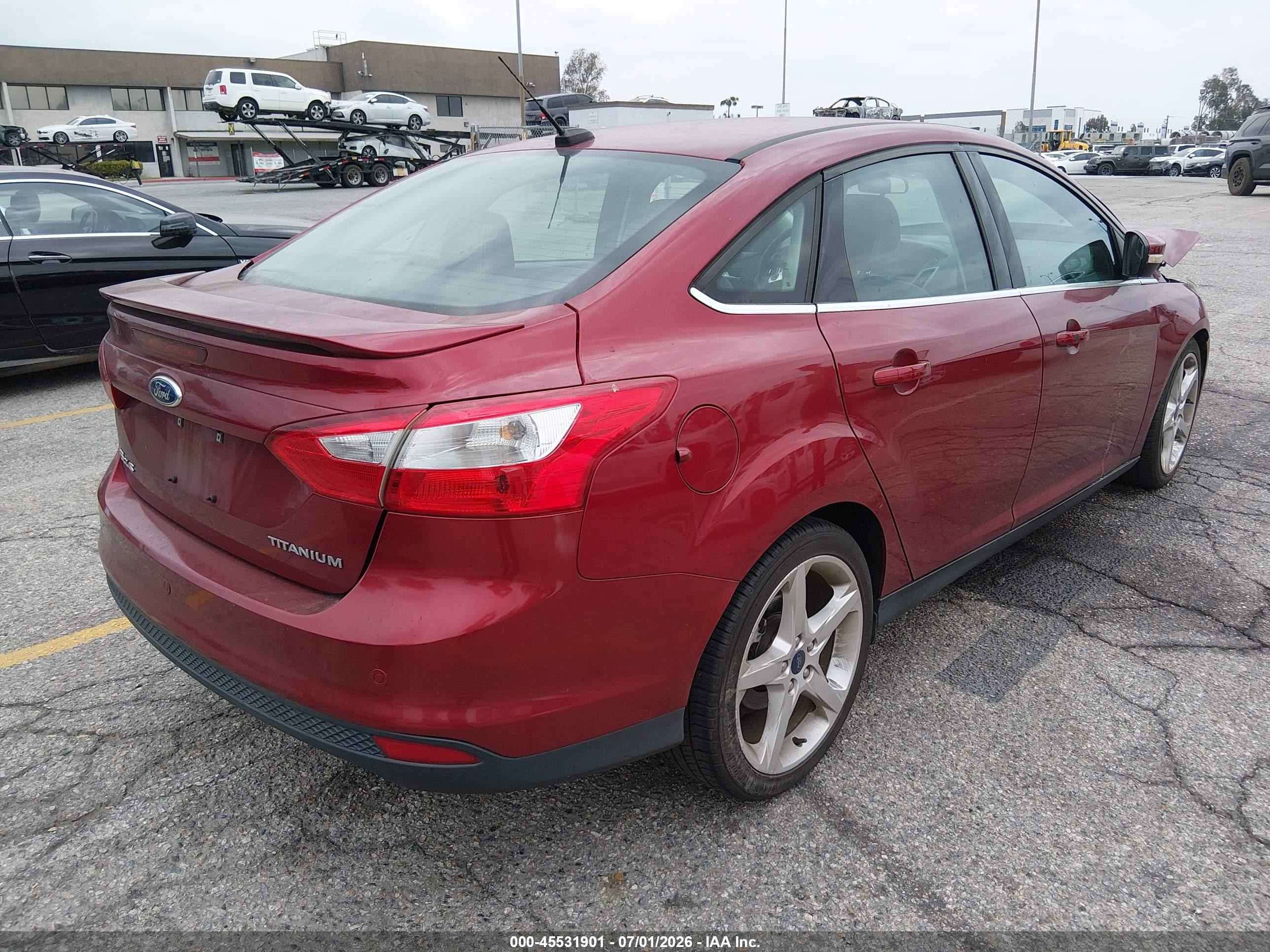 2014 Ford Focus Titanium Red vin: 1FADP3J27EL300435