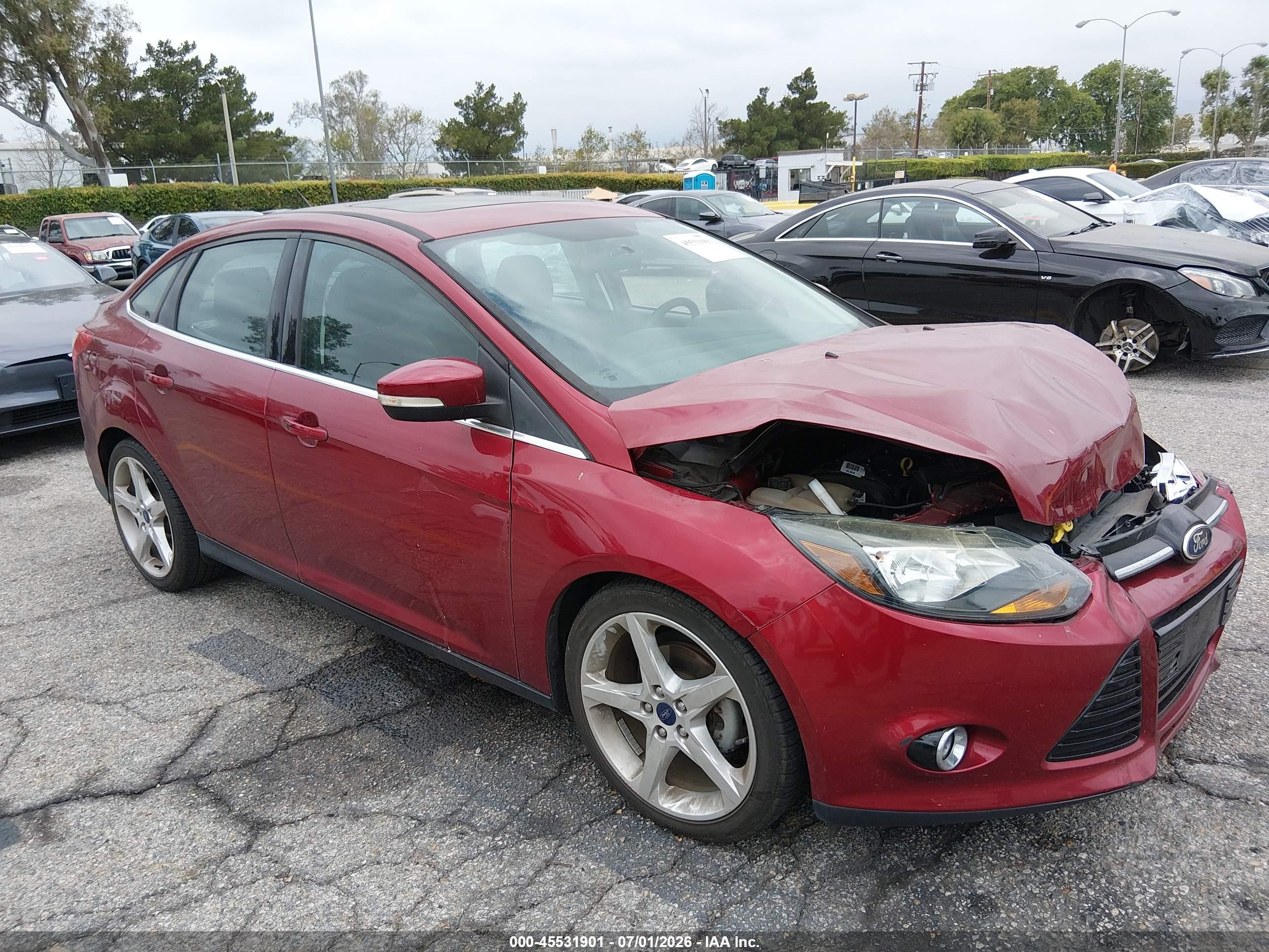 2014 Ford Focus Titanium Red vin: 1FADP3J27EL300435