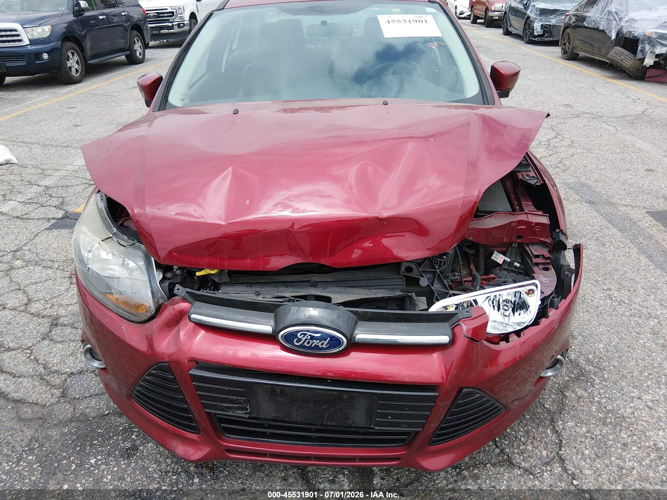 2014 Ford Focus Titanium Red vin: 1FADP3J27EL300435