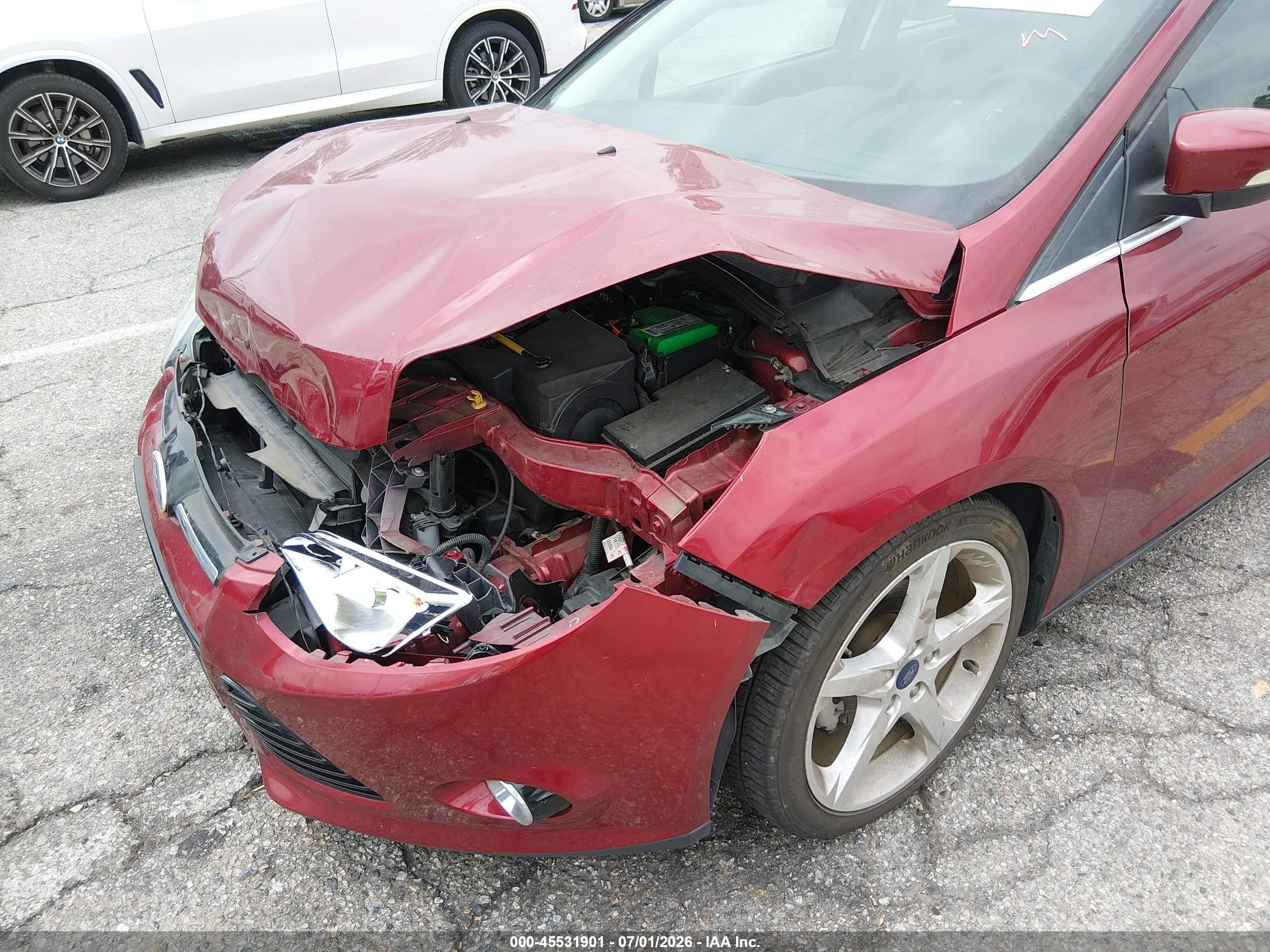 2014 Ford Focus Titanium Red vin: 1FADP3J27EL300435