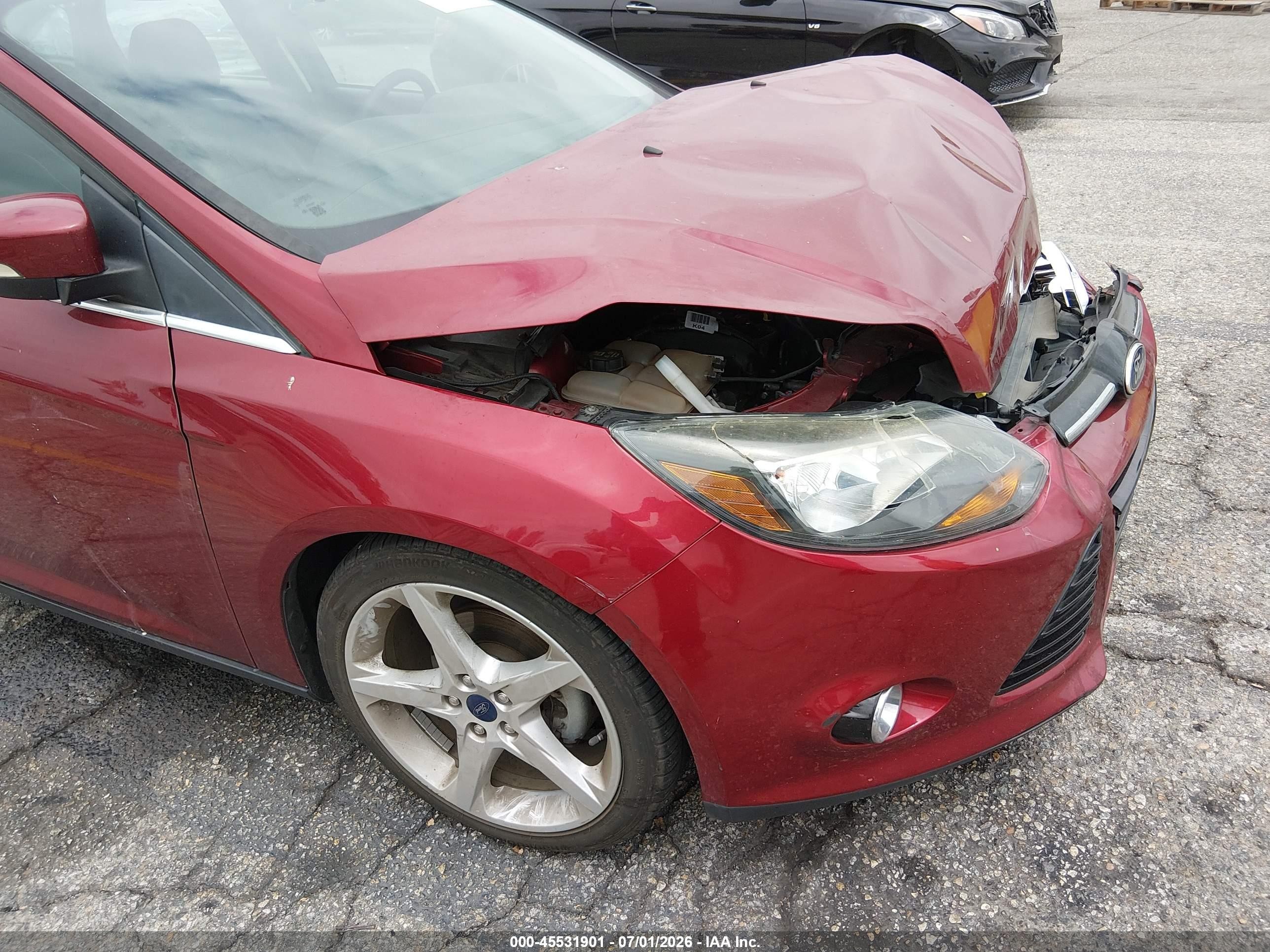 2014 Ford Focus Titanium Red vin: 1FADP3J27EL300435