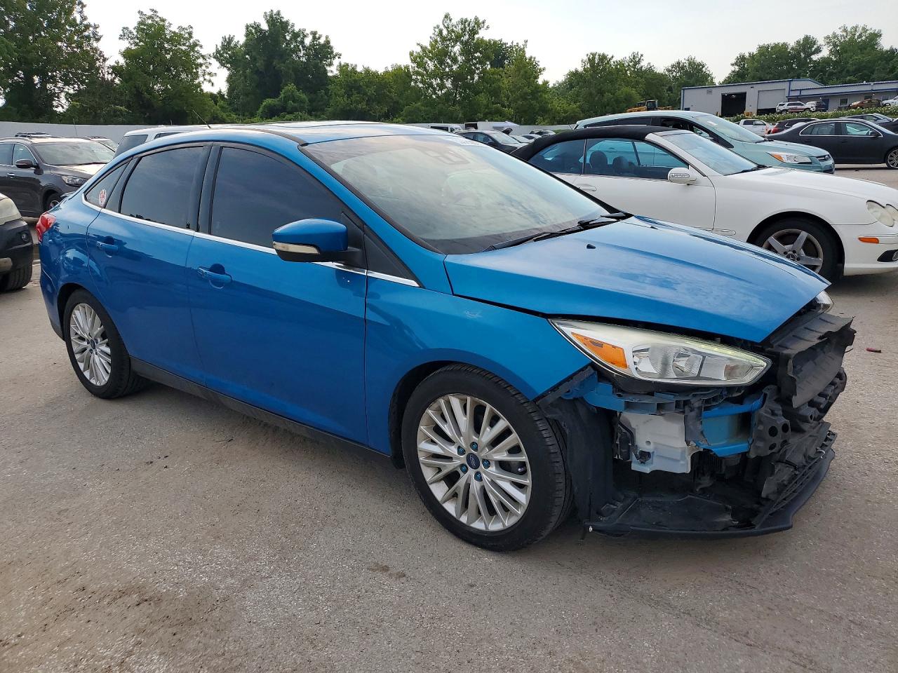 2015 Ford Focus Titanium Blue vin: 1FADP3J27FL239699
