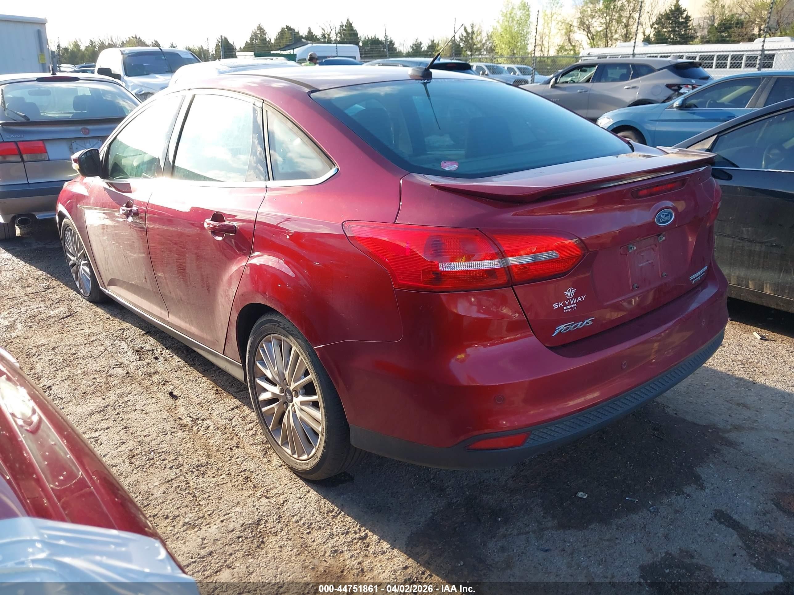 2015 Ford Focus Titanium Red vin: 1FADP3J27FL247446