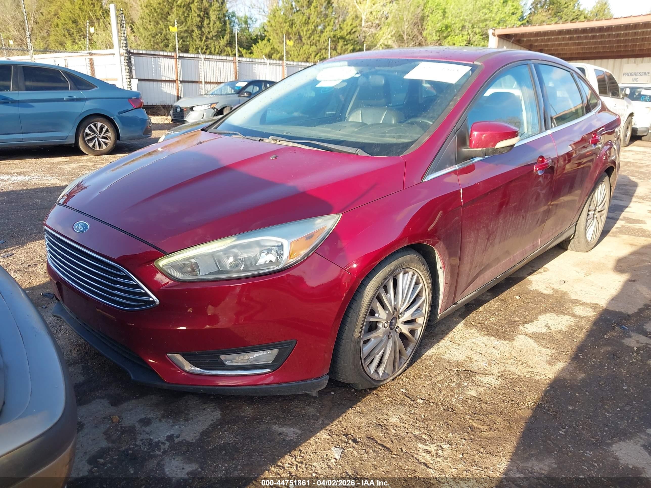 2015 Ford Focus Titanium Red vin: 1FADP3J27FL247446