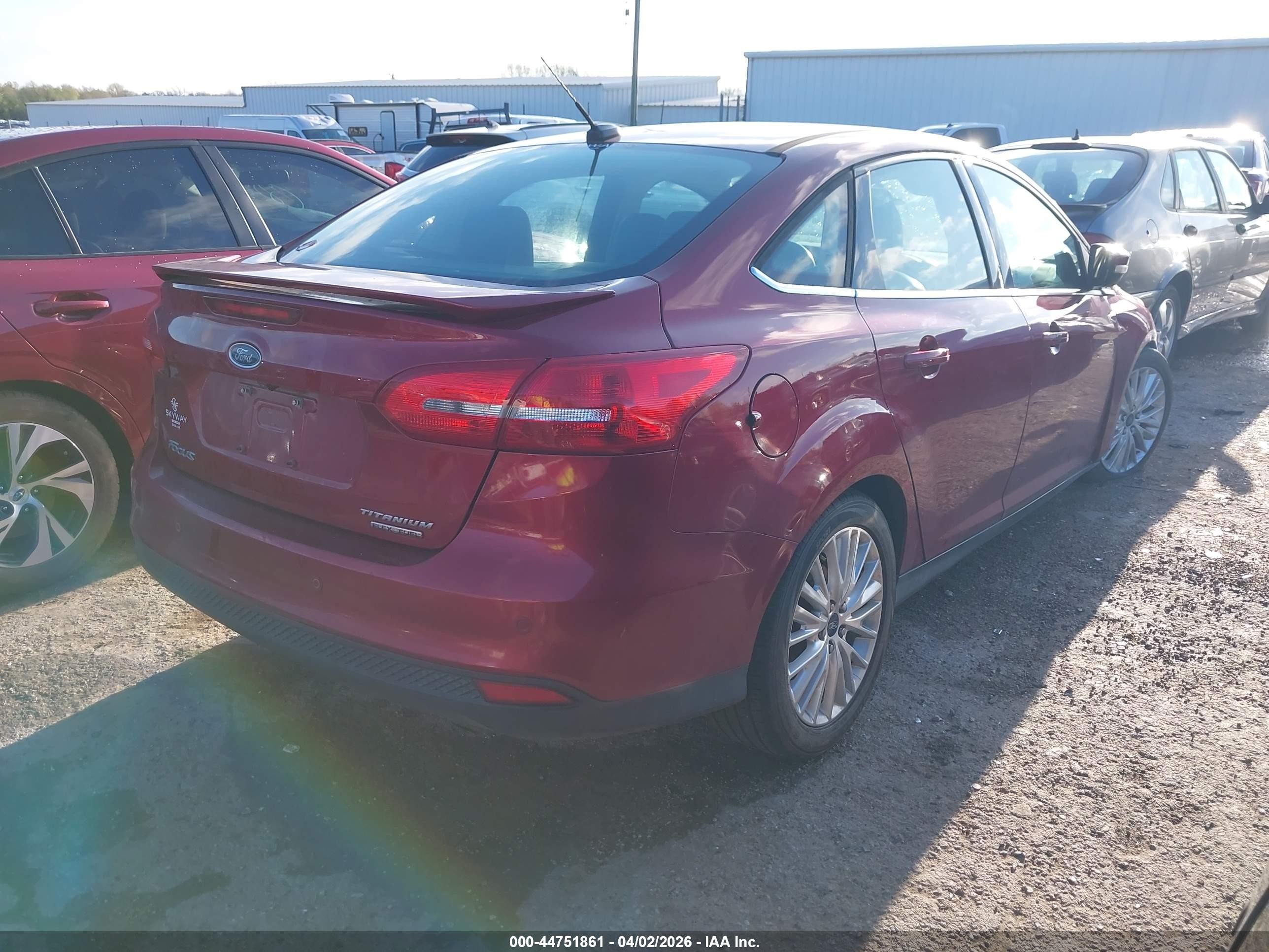 2015 Ford Focus Titanium Red vin: 1FADP3J27FL247446
