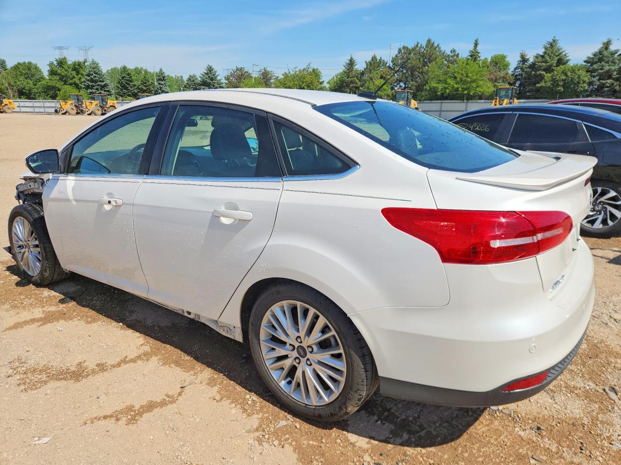 2015 Ford Focus Titanium White vin: 1FADP3J27FL273934