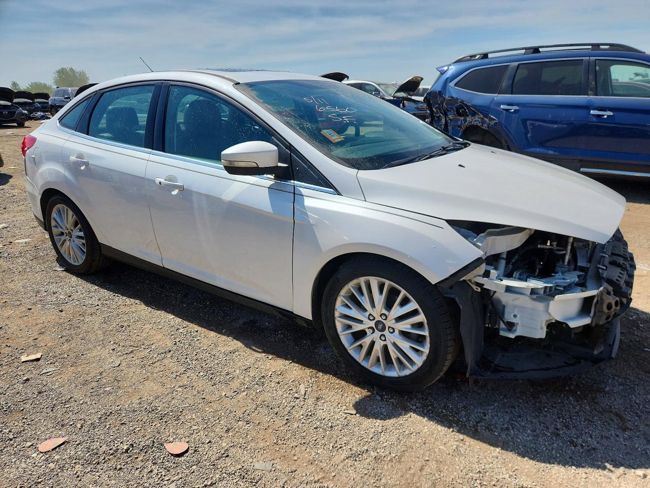 2015 Ford Focus Titanium White vin: 1FADP3J27FL273934