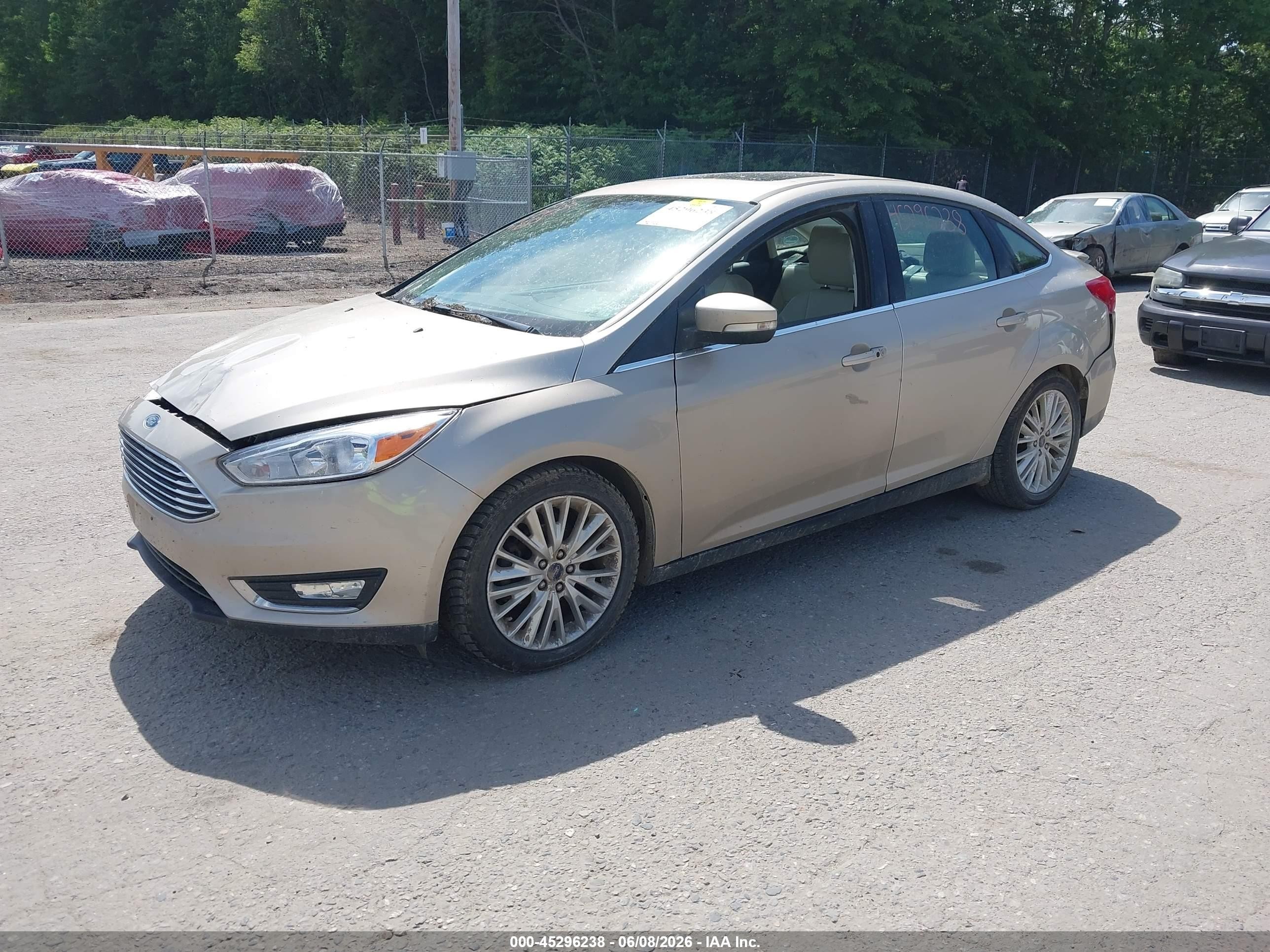2018 Ford Focus Titanium Tan vin: 1FADP3J27JL272095