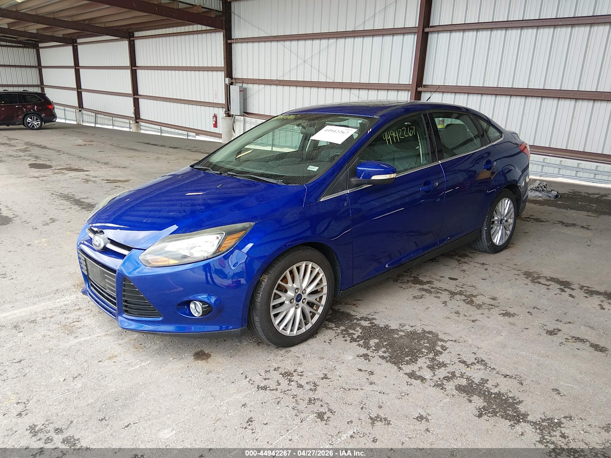 2013 Ford Focus Titanium Blue vin: 1FADP3J28DL115728