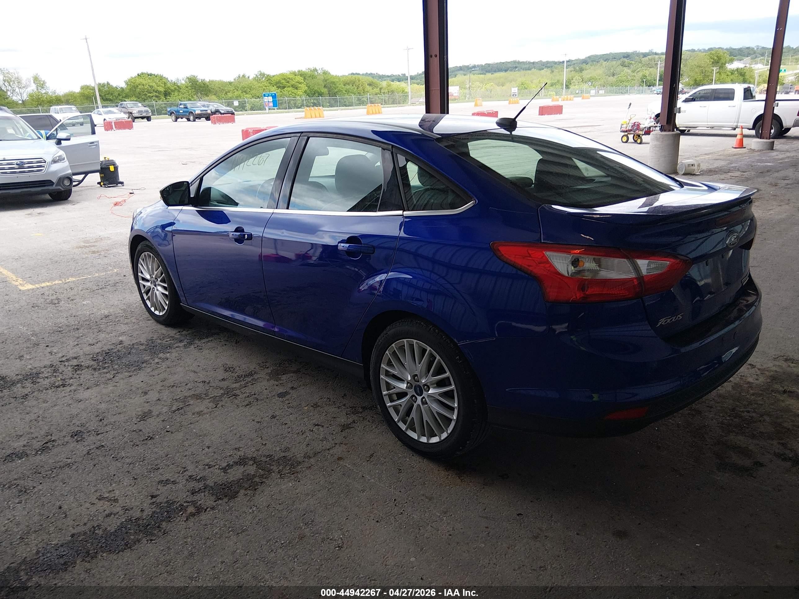 2013 Ford Focus Titanium Blue vin: 1FADP3J28DL115728