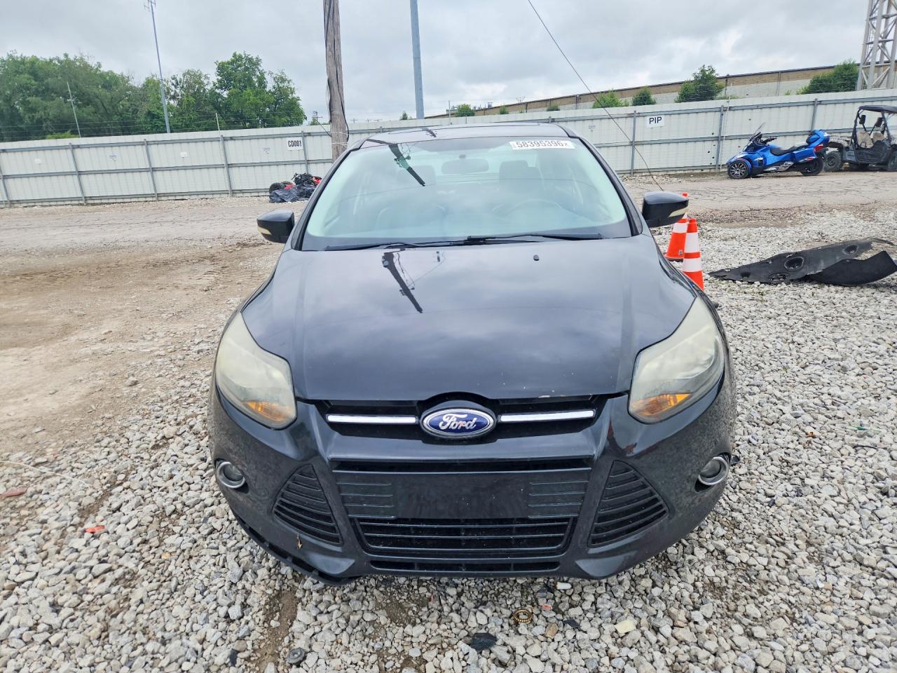 2013 Ford Focus Titanium Black vin: 1FADP3J28DL276371