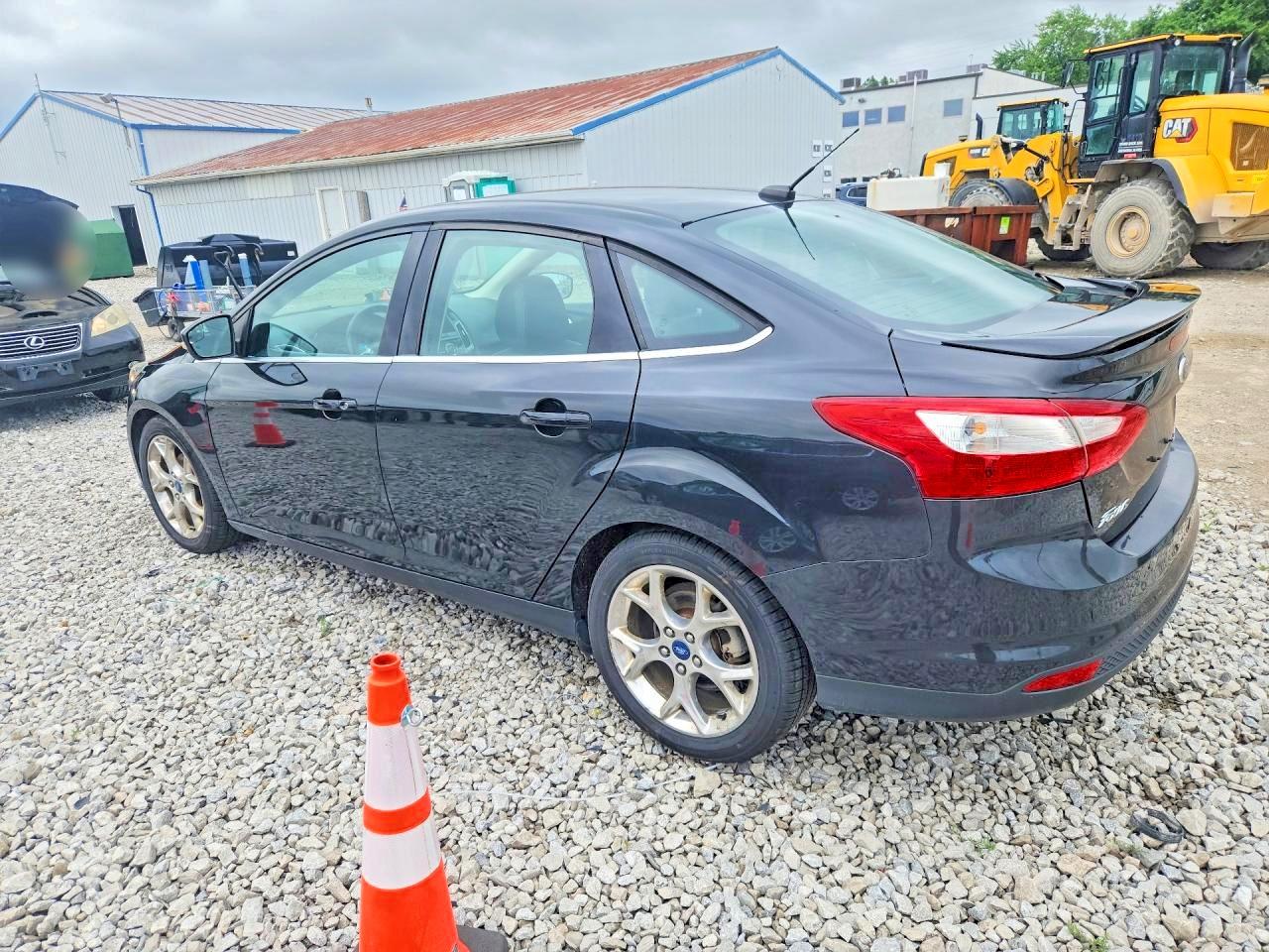 2013 Ford Focus Titanium Black vin: 1FADP3J28DL276371