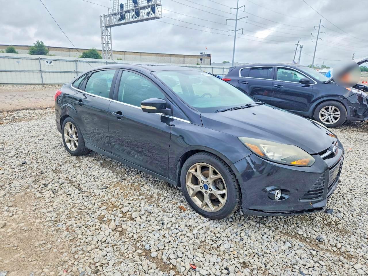 2013 Ford Focus Titanium Black vin: 1FADP3J28DL276371