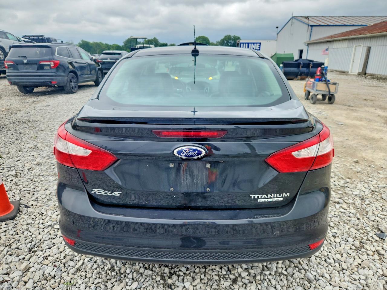 2013 Ford Focus Titanium Black vin: 1FADP3J28DL276371