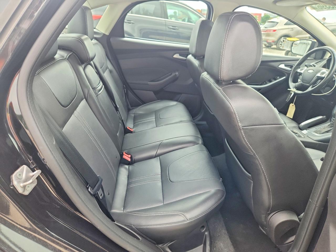 2013 Ford Focus Titanium Black vin: 1FADP3J28DL276371