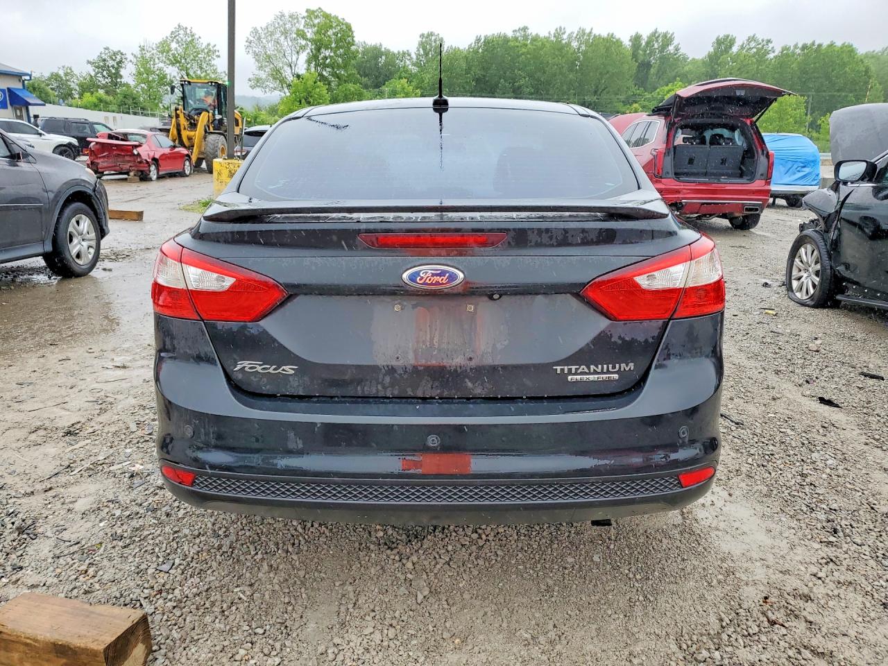 2014 Ford Focus Titanium Black vin: 1FADP3J28EL128870