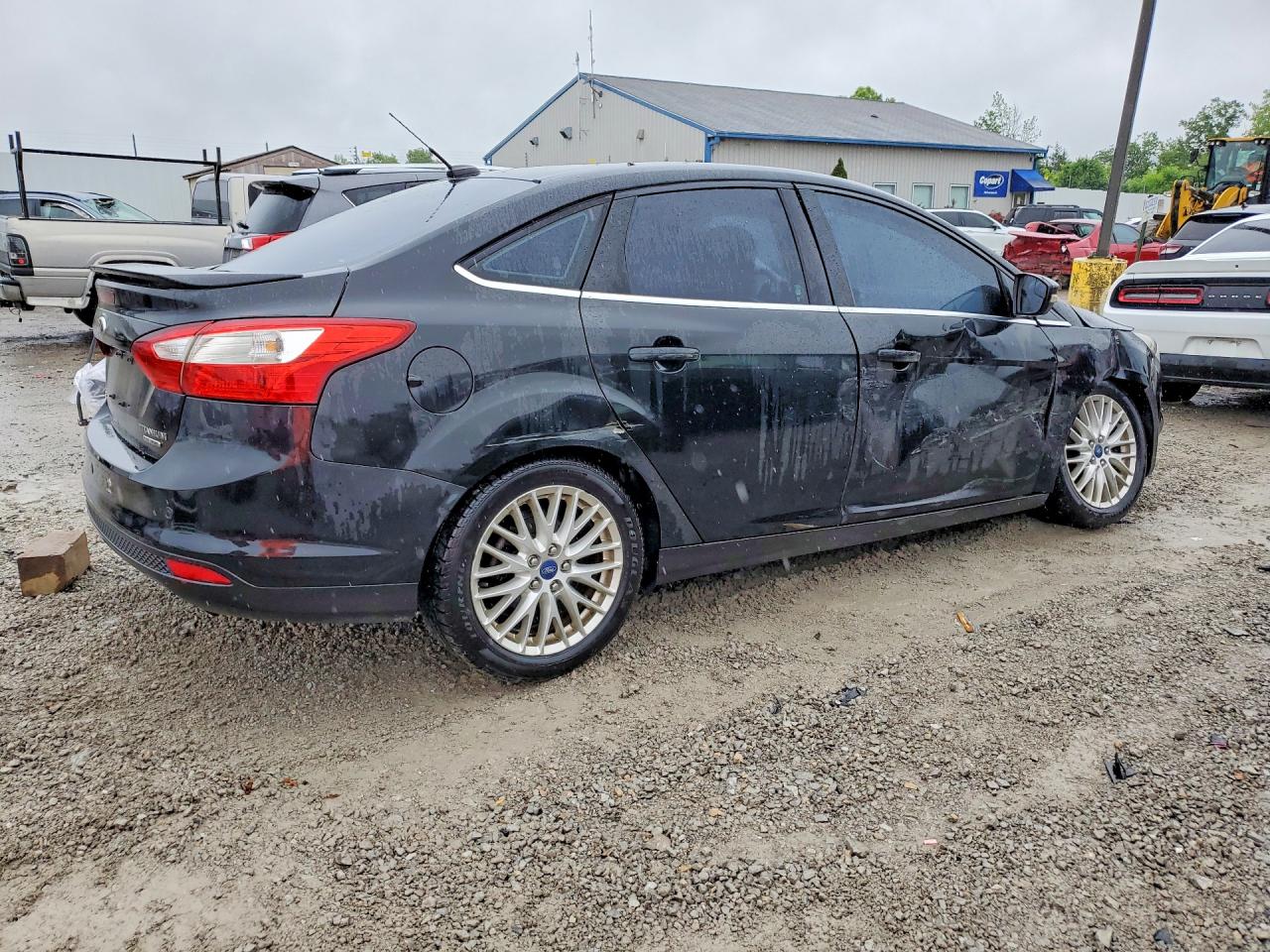 2014 Ford Focus Titanium Black vin: 1FADP3J28EL128870